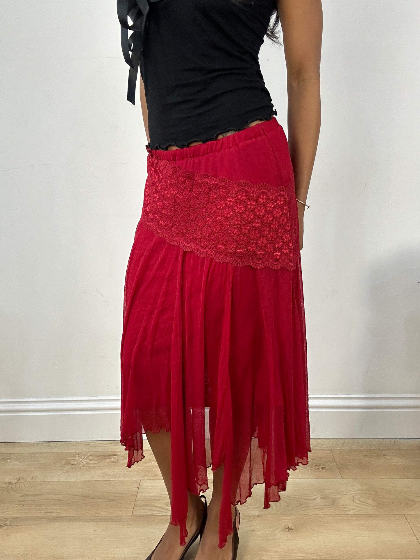 BEST PICKS | small red asymmetrical flowy skirt with floral embroidery