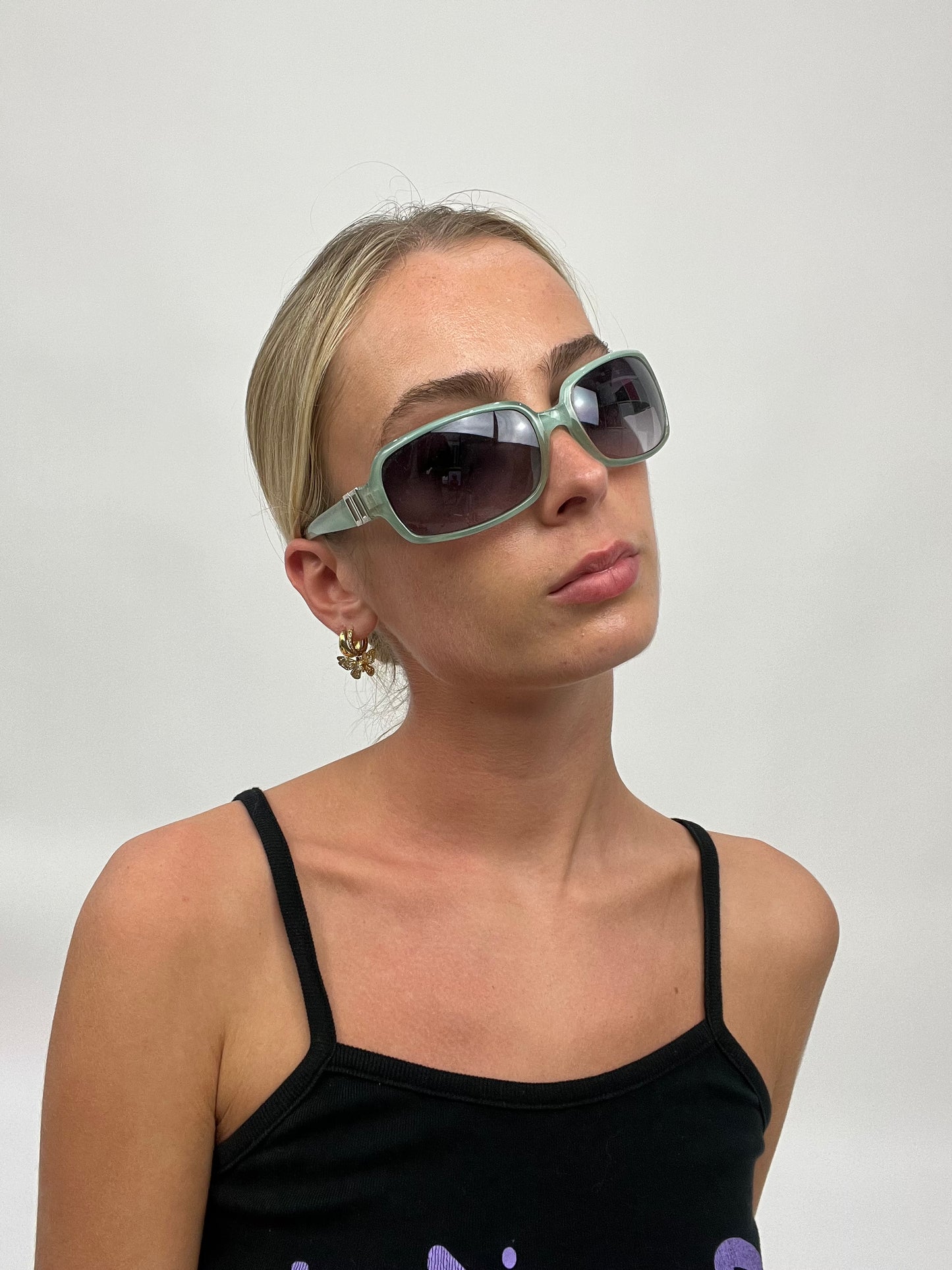 COCONUT GIRL DROP | blue sunglasses with silver detail on side