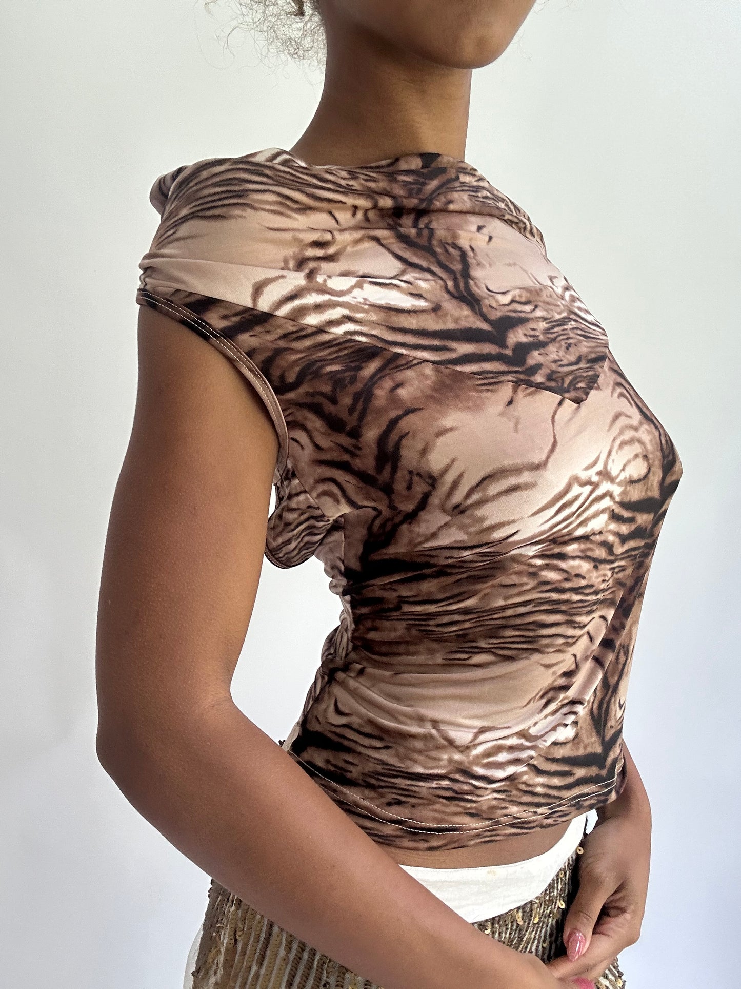 olivia rodrigo drop | small brown striped open back top