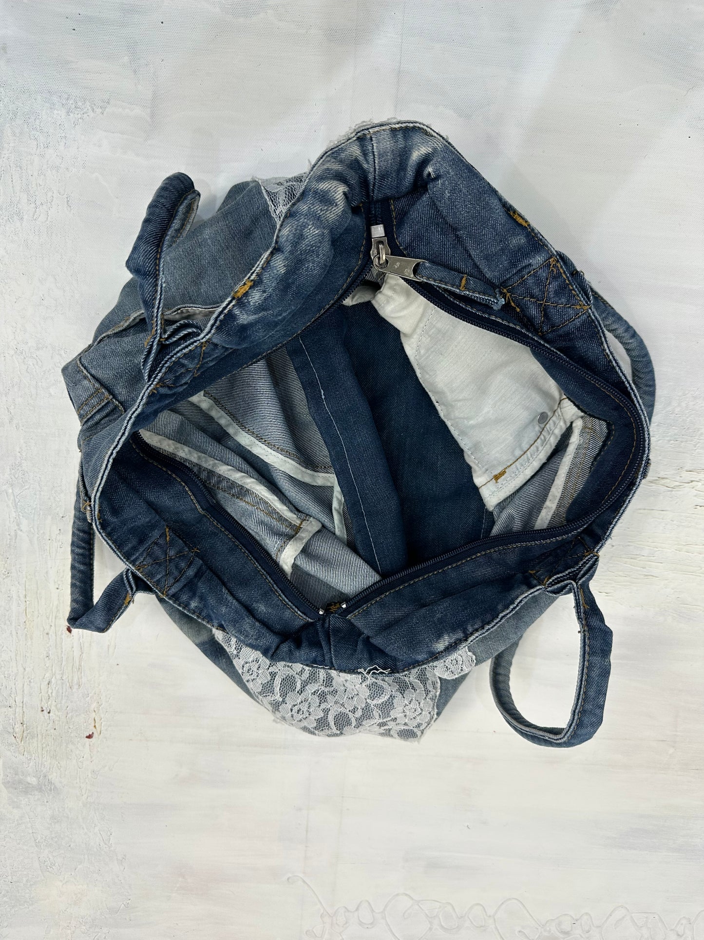 vintage edit: indie sleaze | blue denim tote bag with lace details