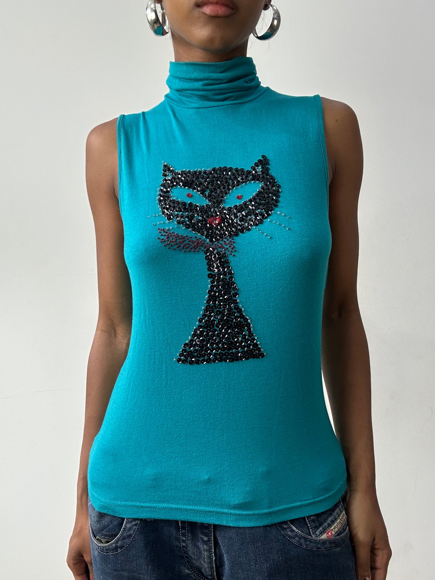 midsummer edit | small blue sleeveless turtleneck with sequin cat print