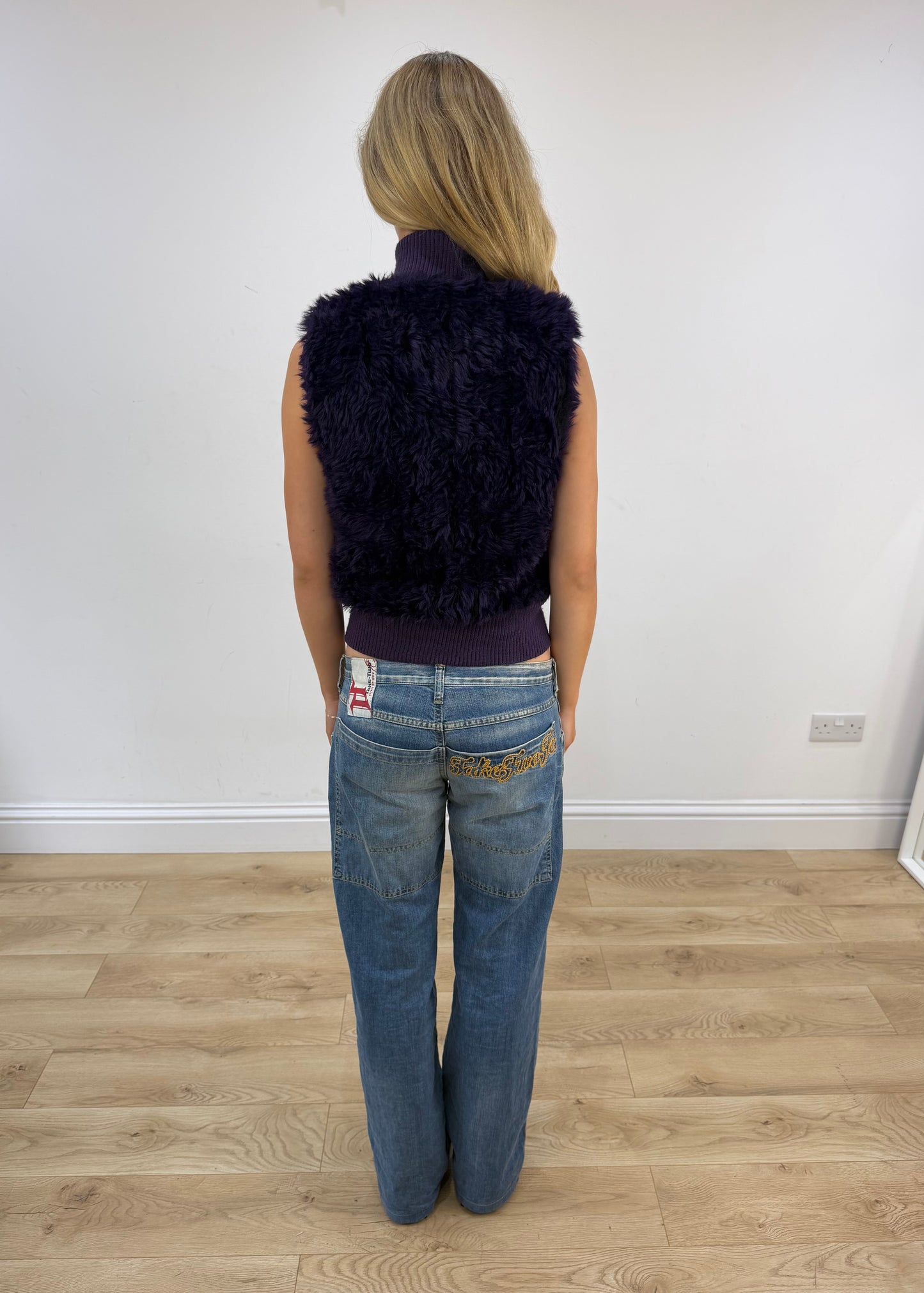 small purple faux fur gilet