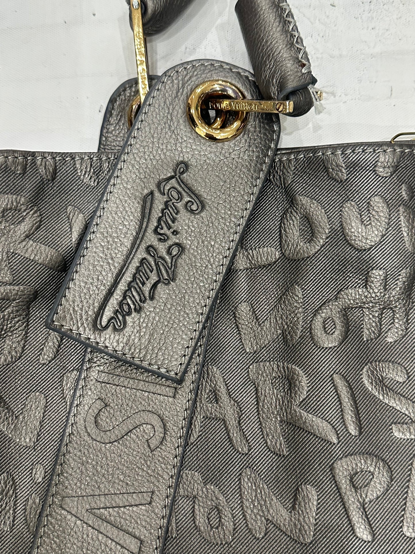 devil wears prada | silver louis vuitton monogram shoulder bag