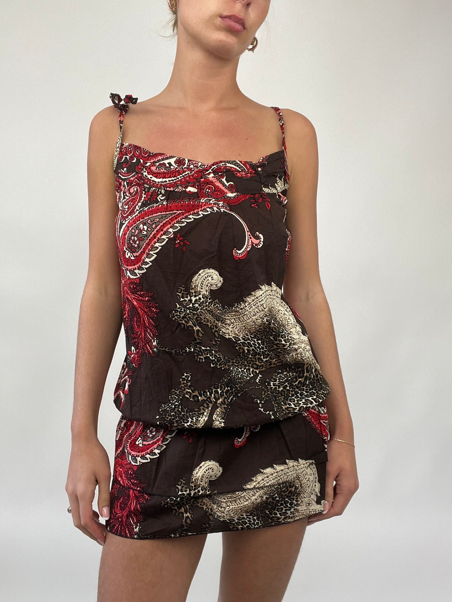 PALM BEACH DROP | small brown mini dress with red paisley pattern all over