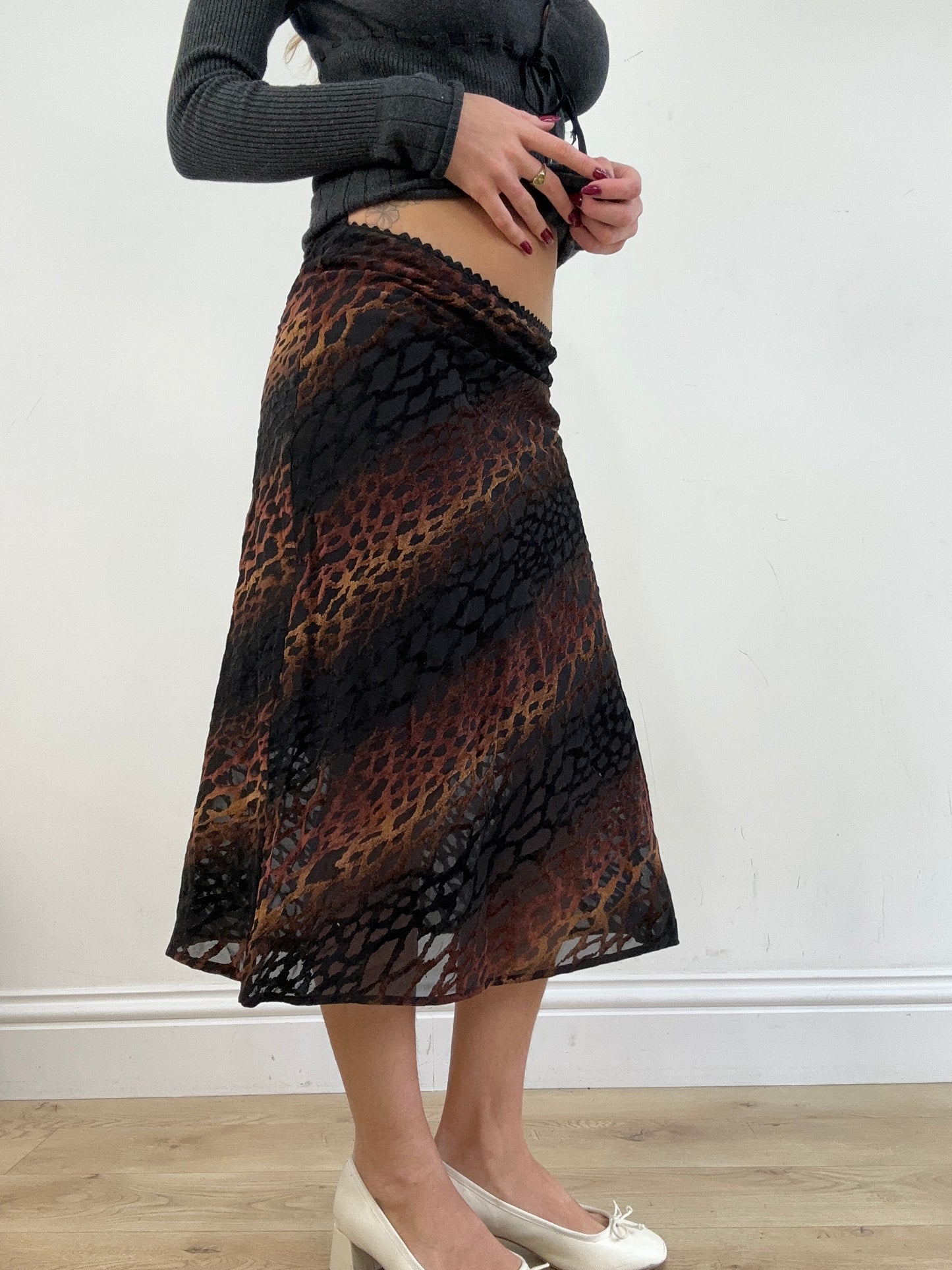 vintage edit thirteen | small black and brown animal print midi skirt