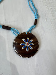 aquamarine drop | one size turquoise beaded wooden flower necklace