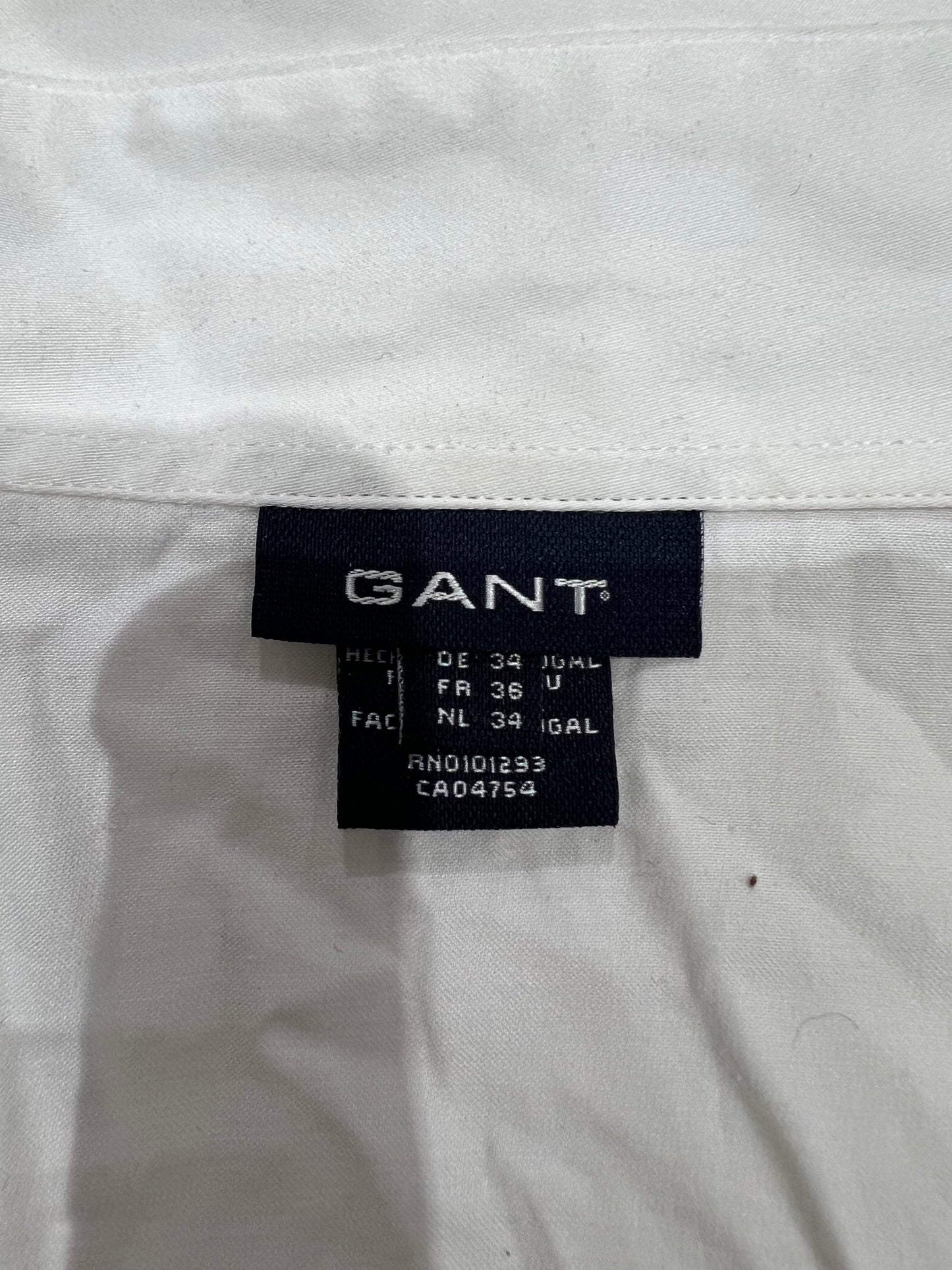 small sleeveless collared shirt