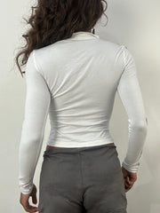 athleisure edit | small white guess zip up long sleeve top