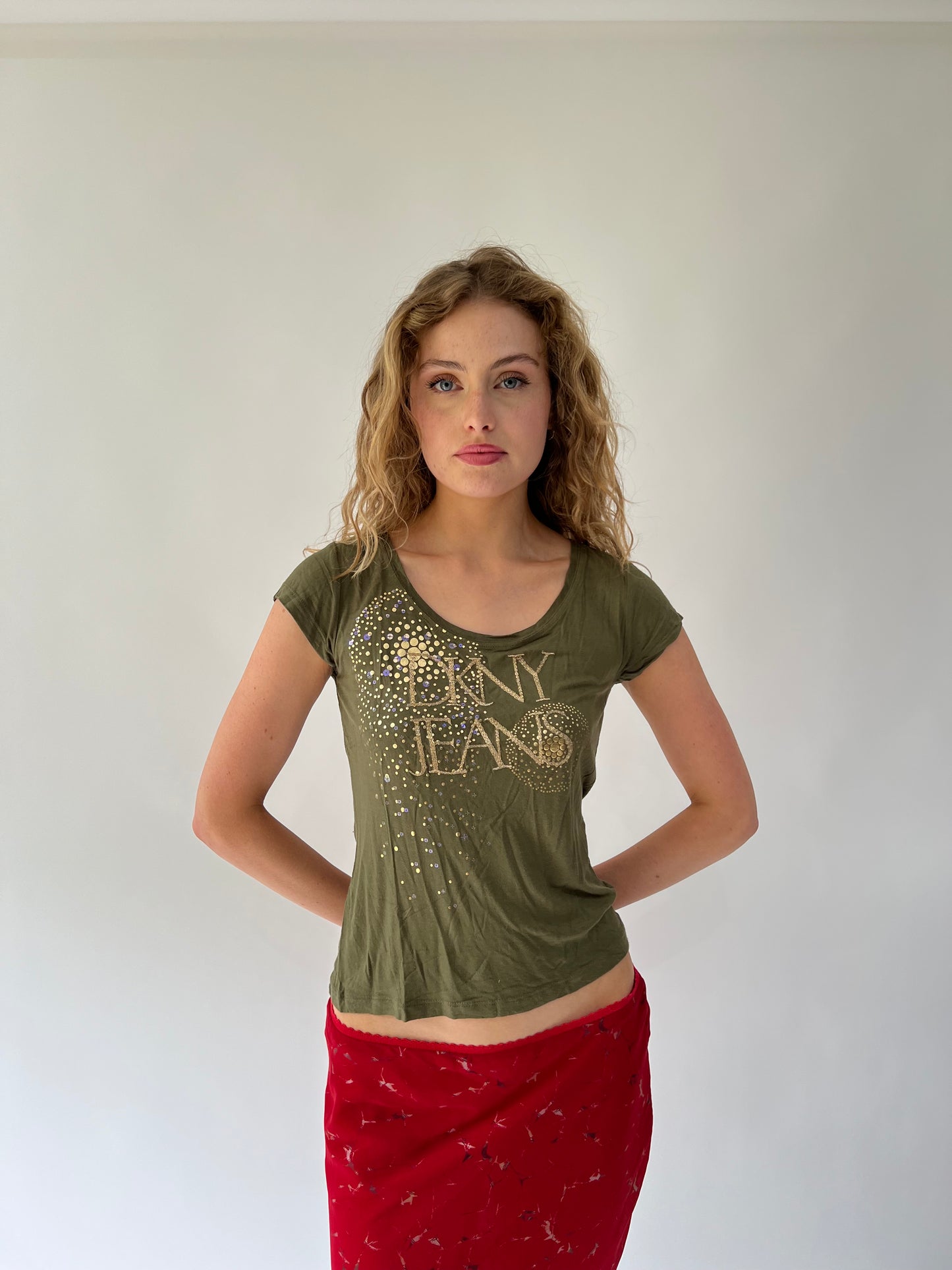 SATC drop | medium green DKNY jeans top