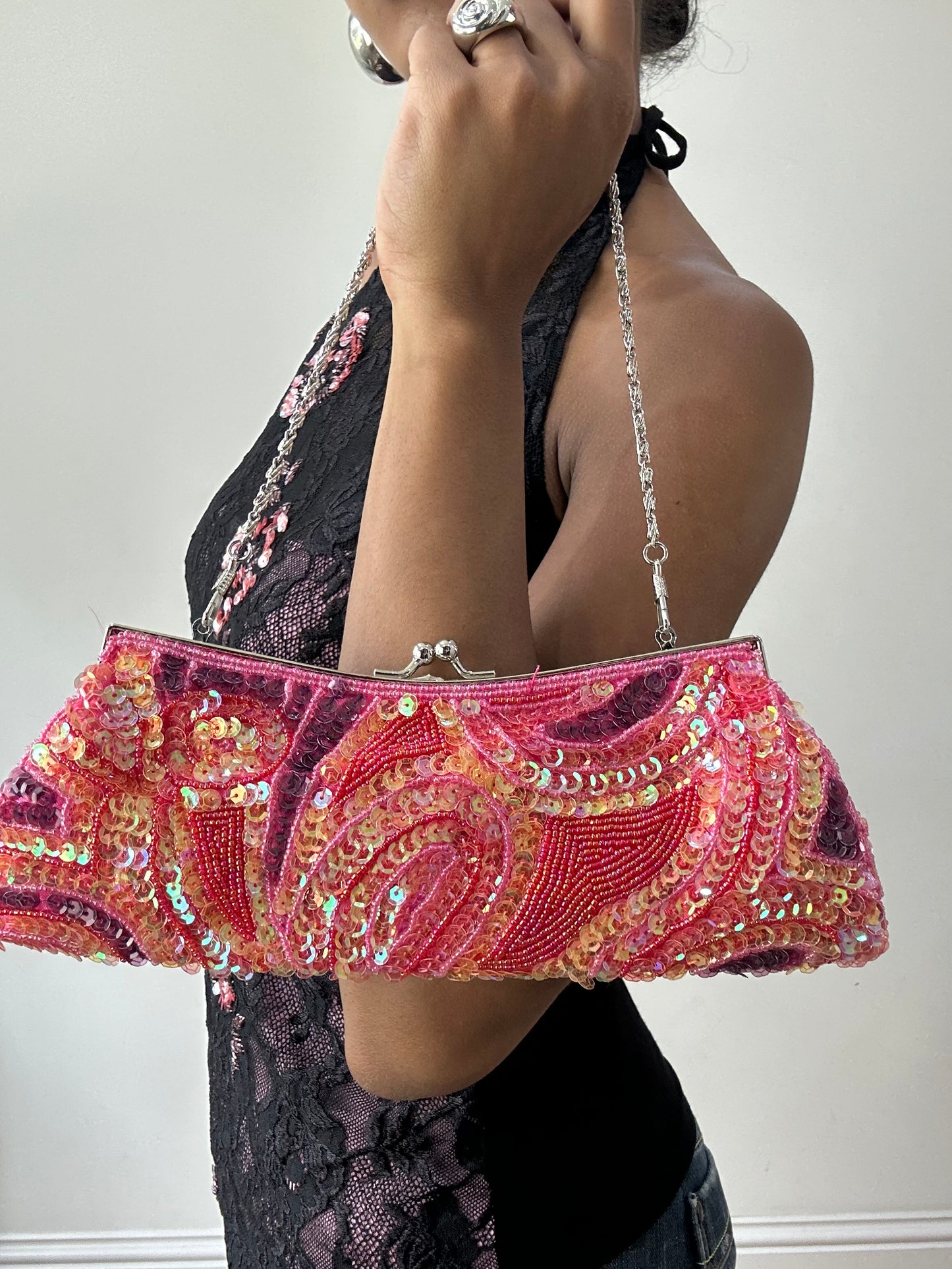 BEST PICKS | pink and purple shoulder bag with iridescent sequins