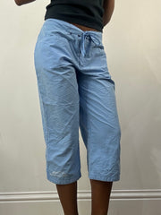 athleisure edit | medium blue cropped trousers with floral embroidery