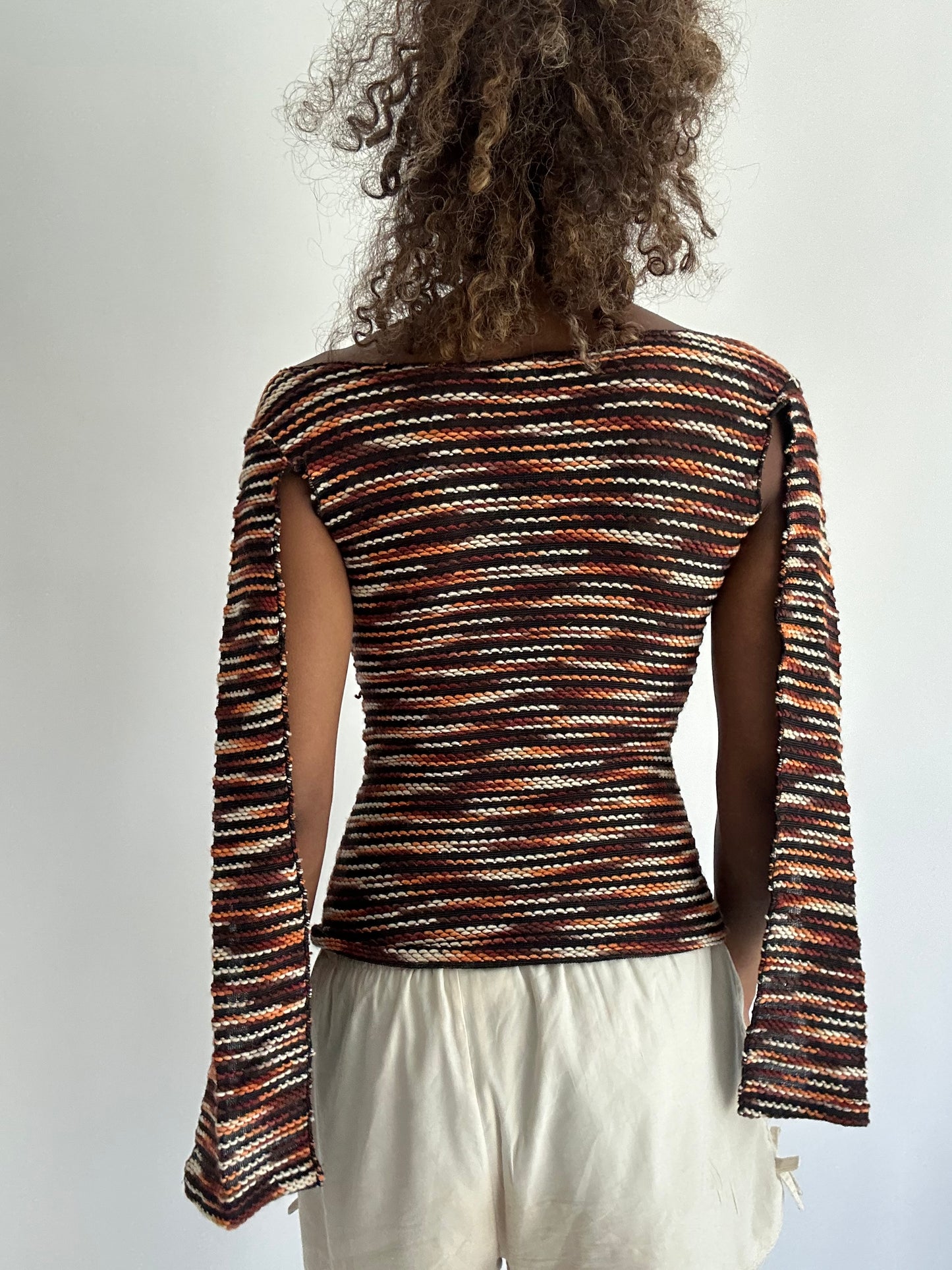 autumn picks | orange and black top with open long sleeves