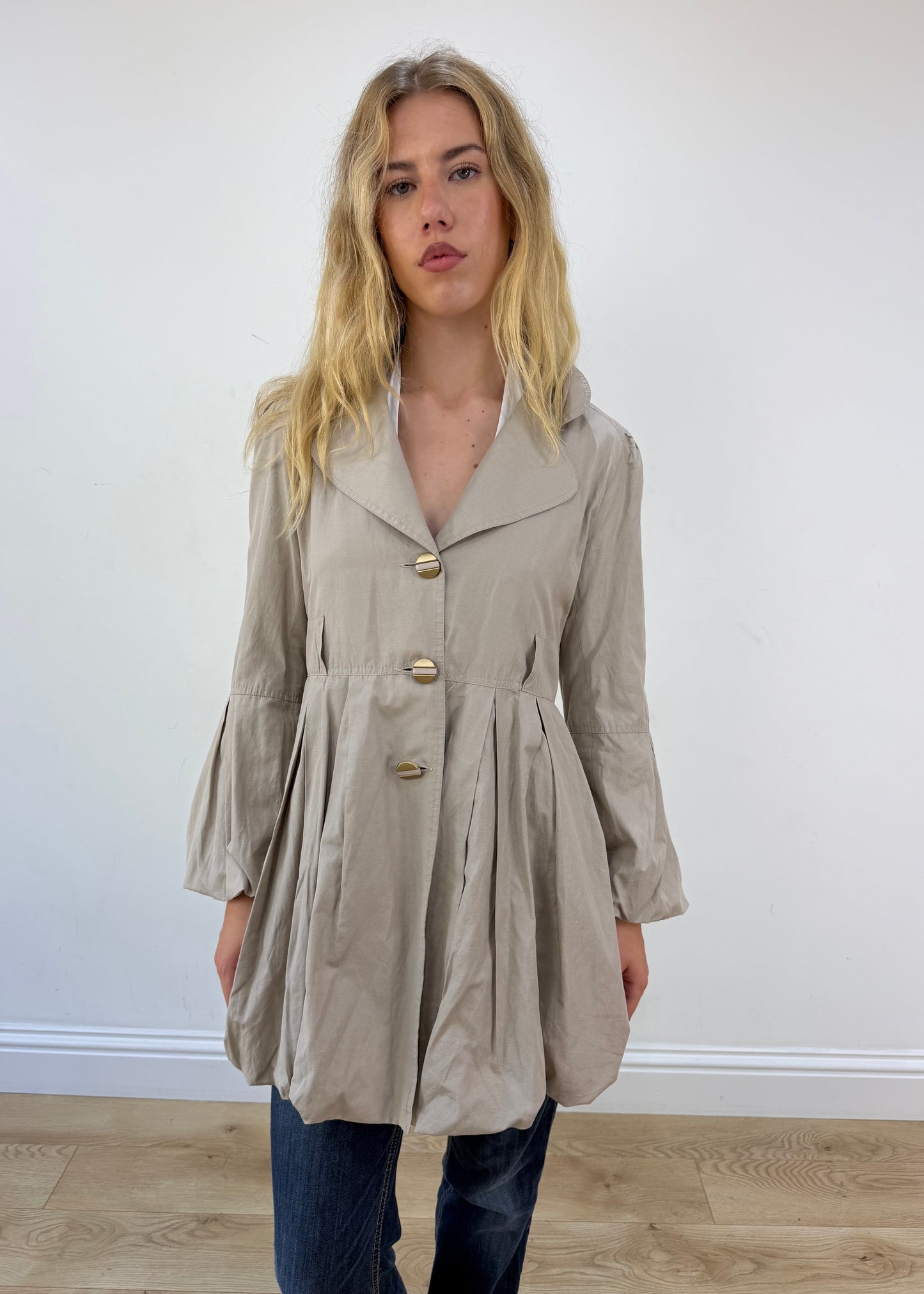 small beige bubble trench coat