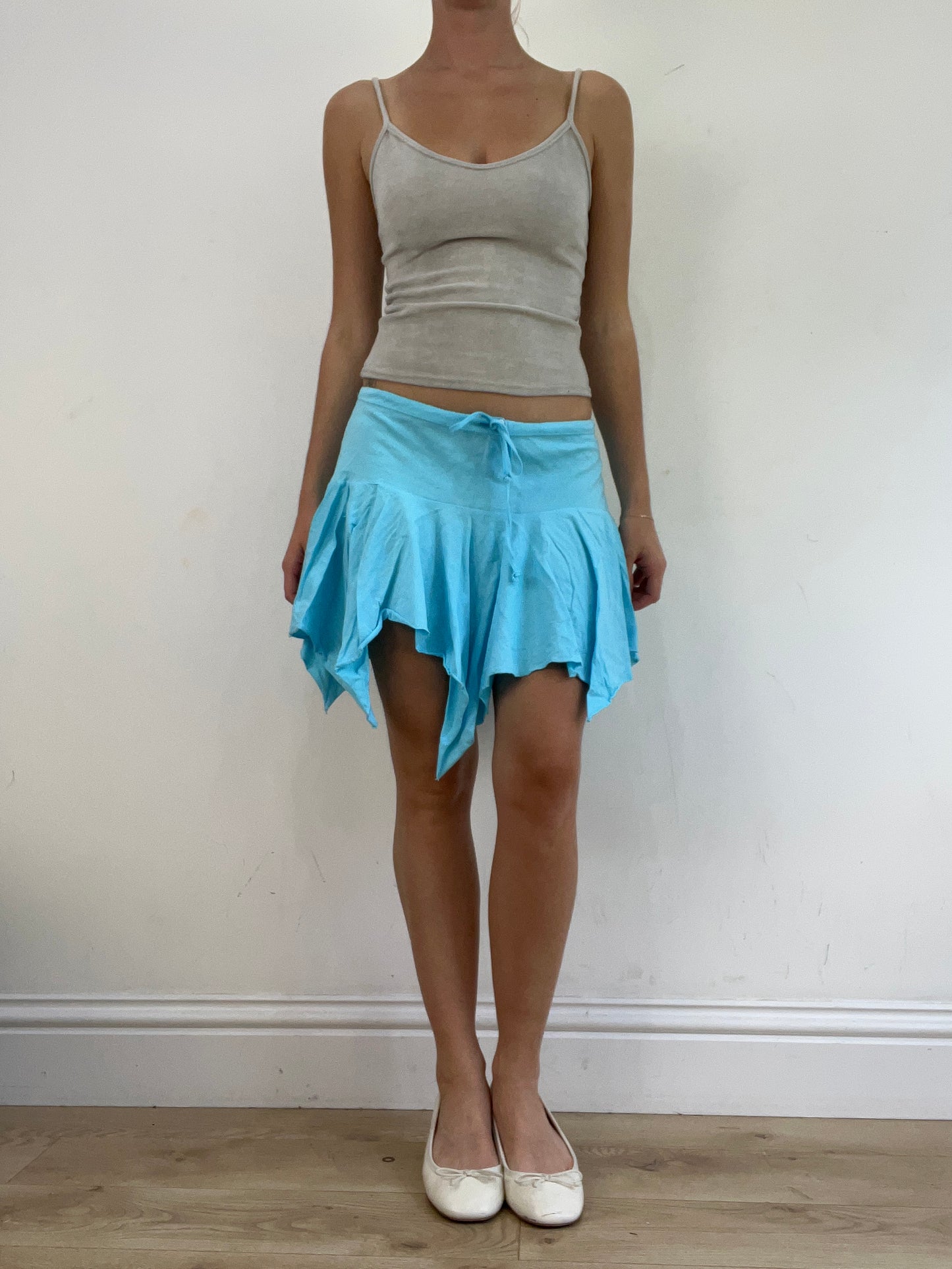 💻‼️ small baby blue billabong asymmetric skirt with white spell out