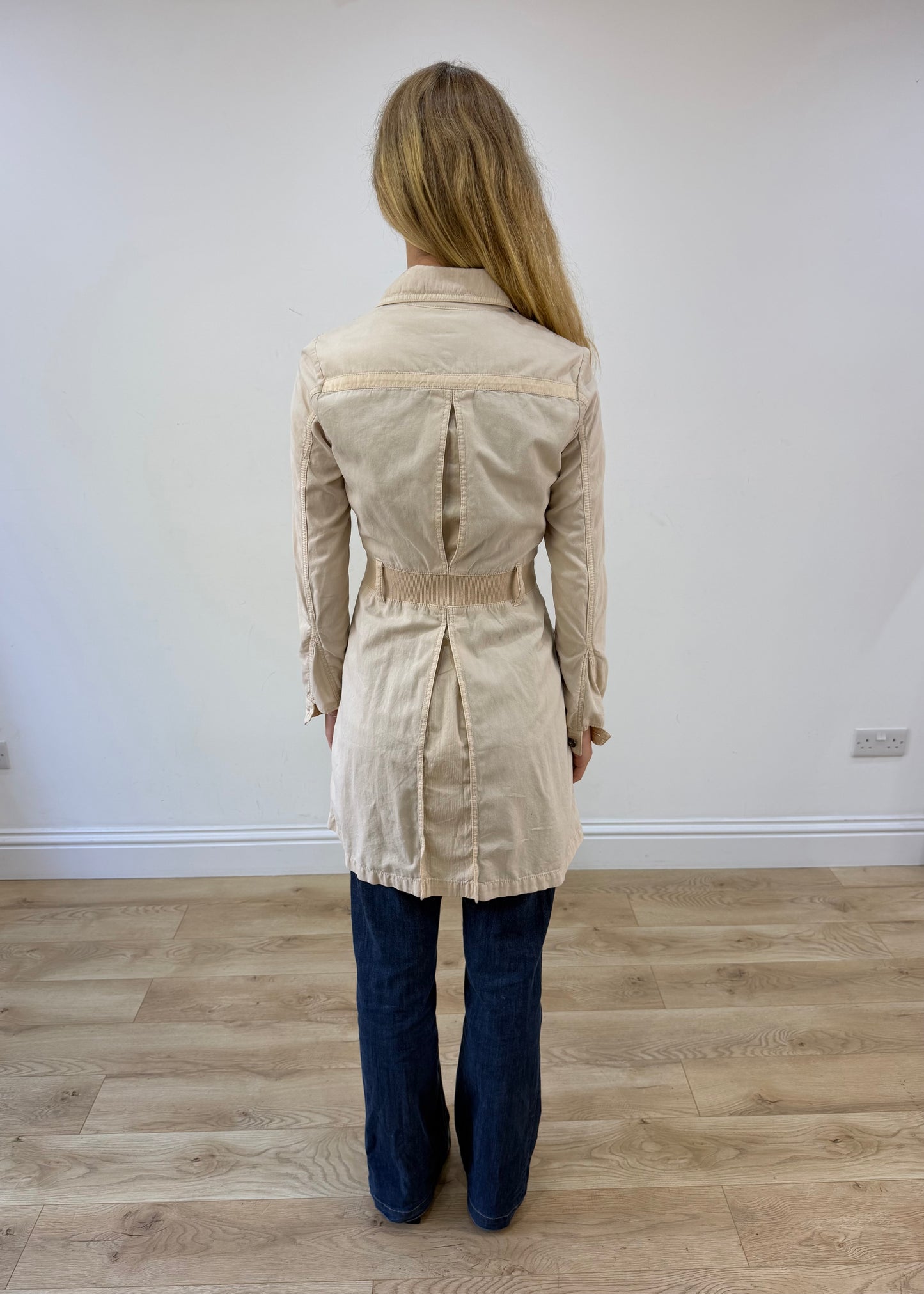 small beige trench coat