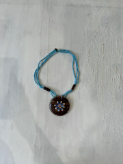 aquamarine drop | one size turquoise beaded wooden flower necklace