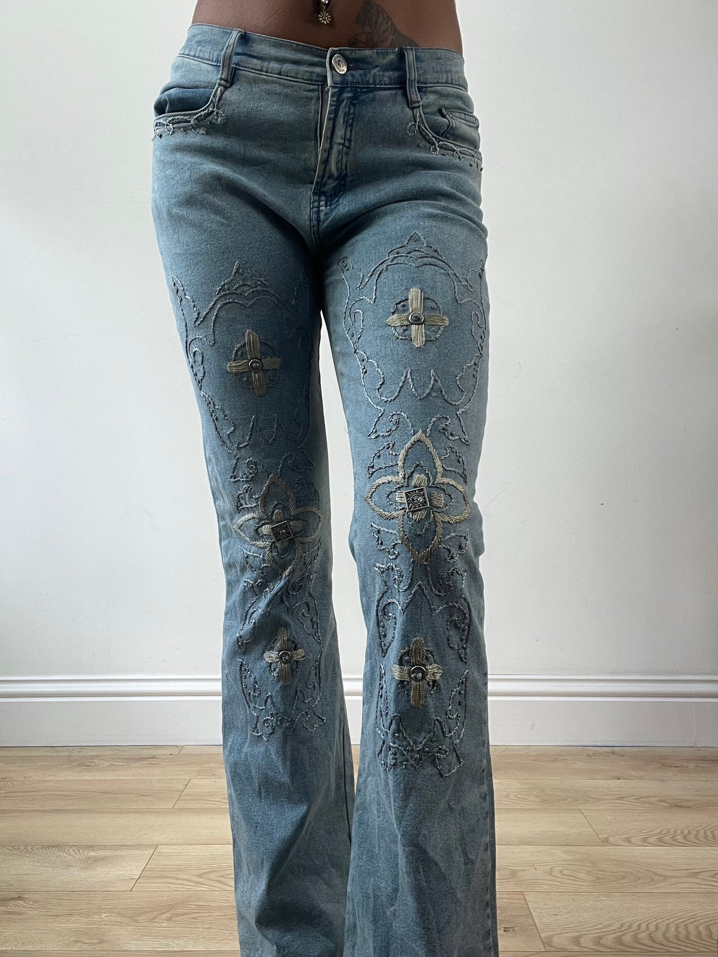 LFW edit | small blue denim jeans with floral embroidery and metal details
