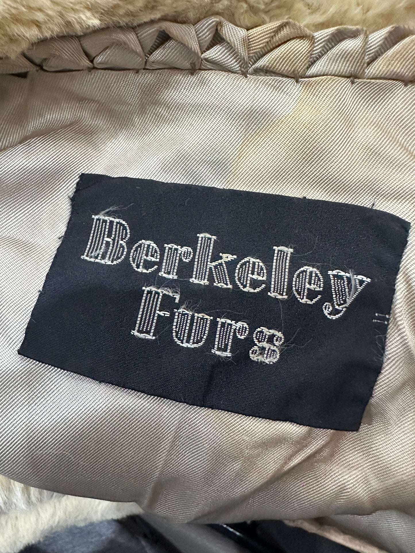 small cream berkeley furs fur trench coat