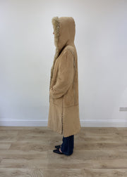 small tan afghan coat