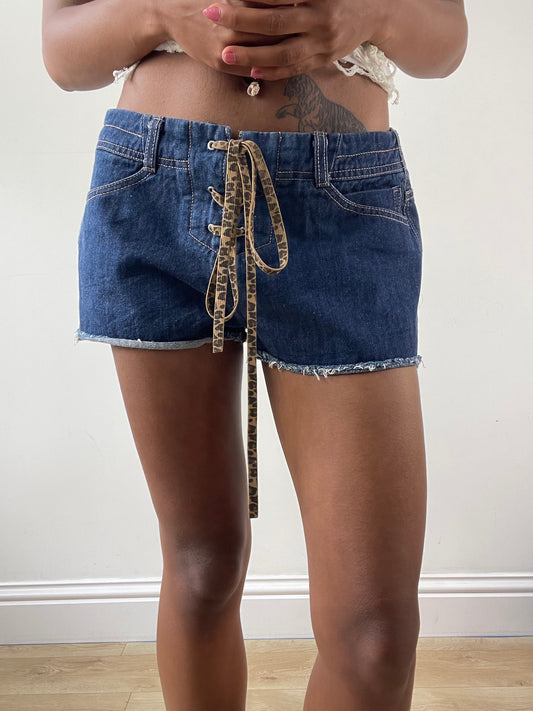 vintage edit: festival | small low waisted blue denim mini shorts with leopard print lace up ties