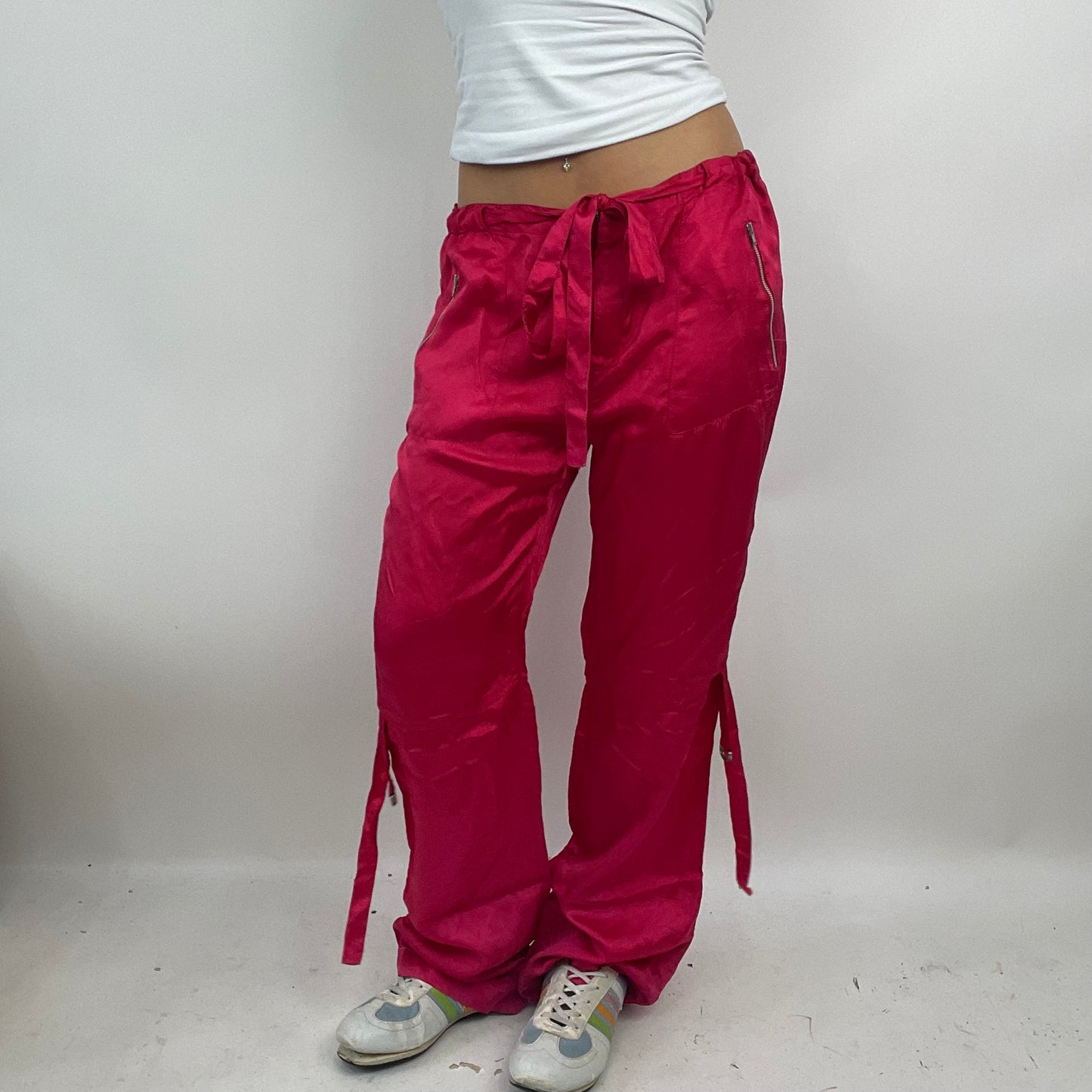 PARIS HILTON DROP | large pink silky drawstring trousers with tassel detail