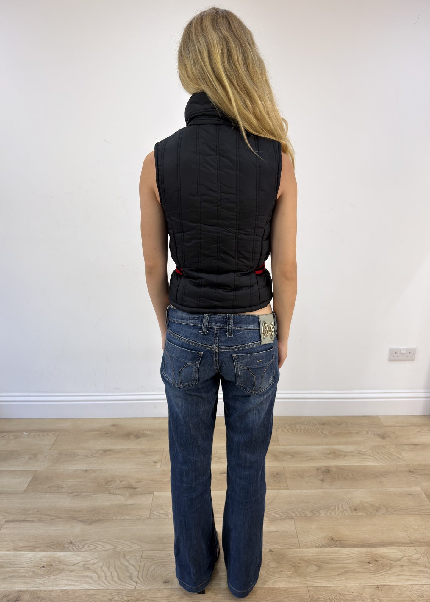 small black and red puffer gilet
