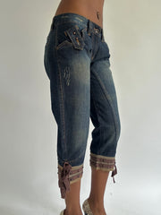 euro trash | medium blue denim capris with tie cuffs