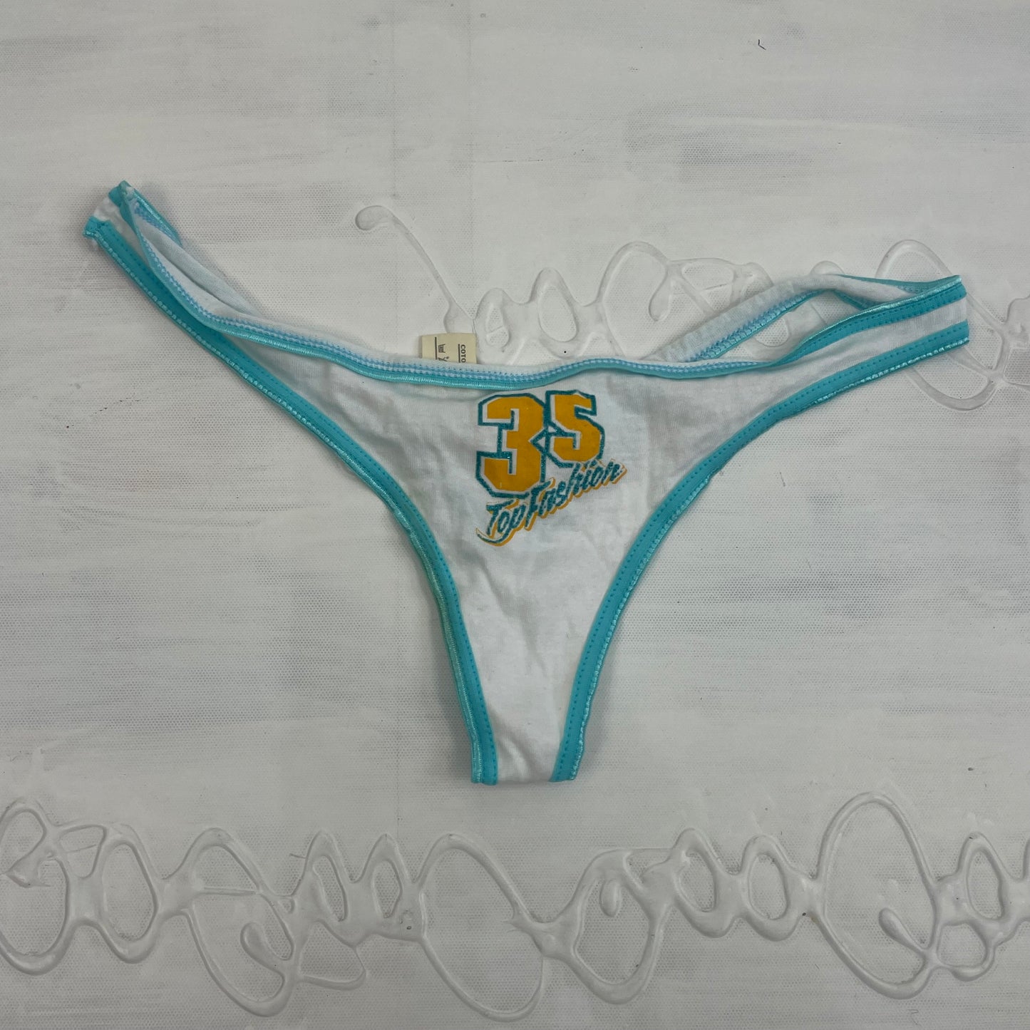 CHALET GIRL DROP | small white and blue graphic thong