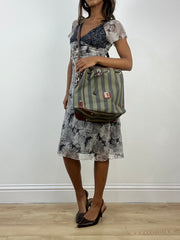vintage edit: indie sleaze | green and navy striped shoulder bag