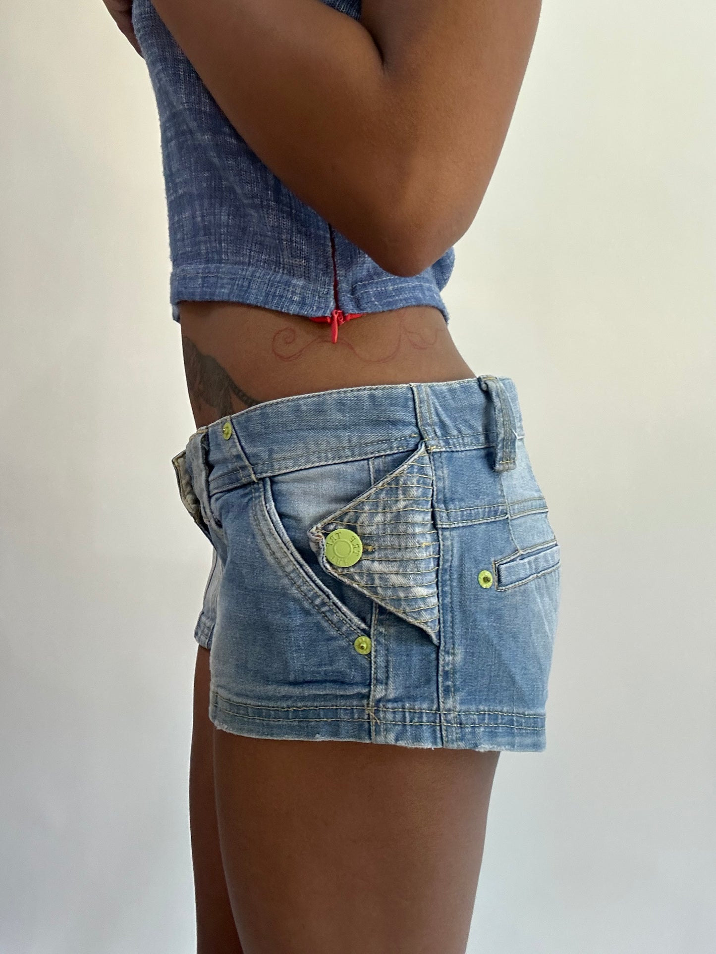 wag drop | medium blue denim mini shorts with yellow detailing