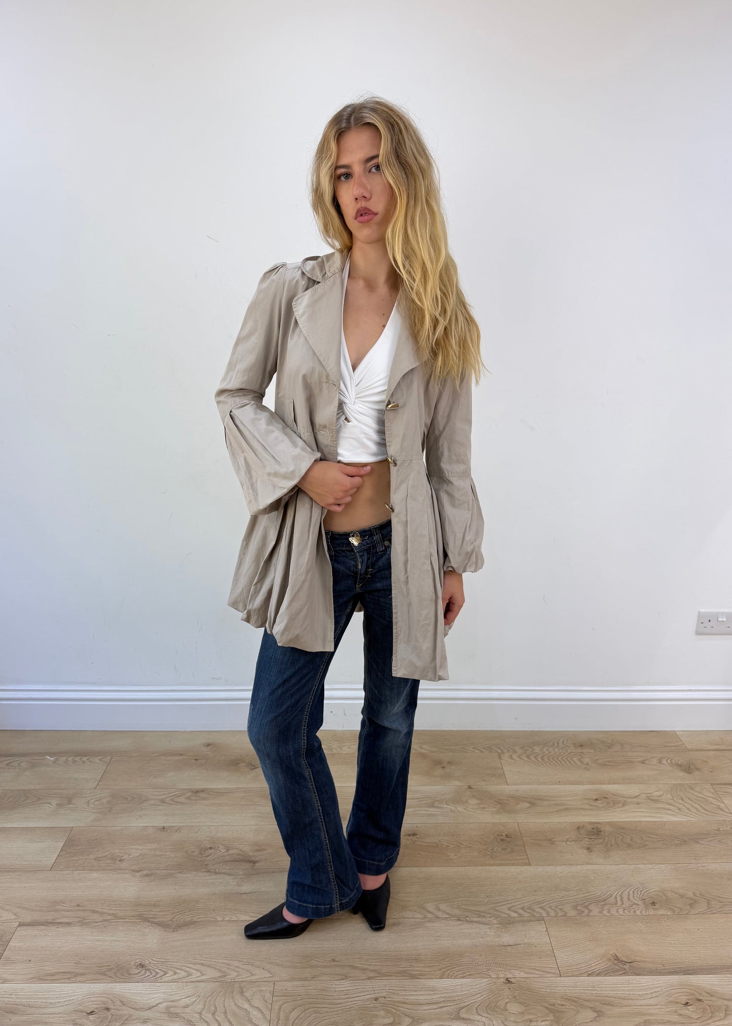small beige bubble trench coat