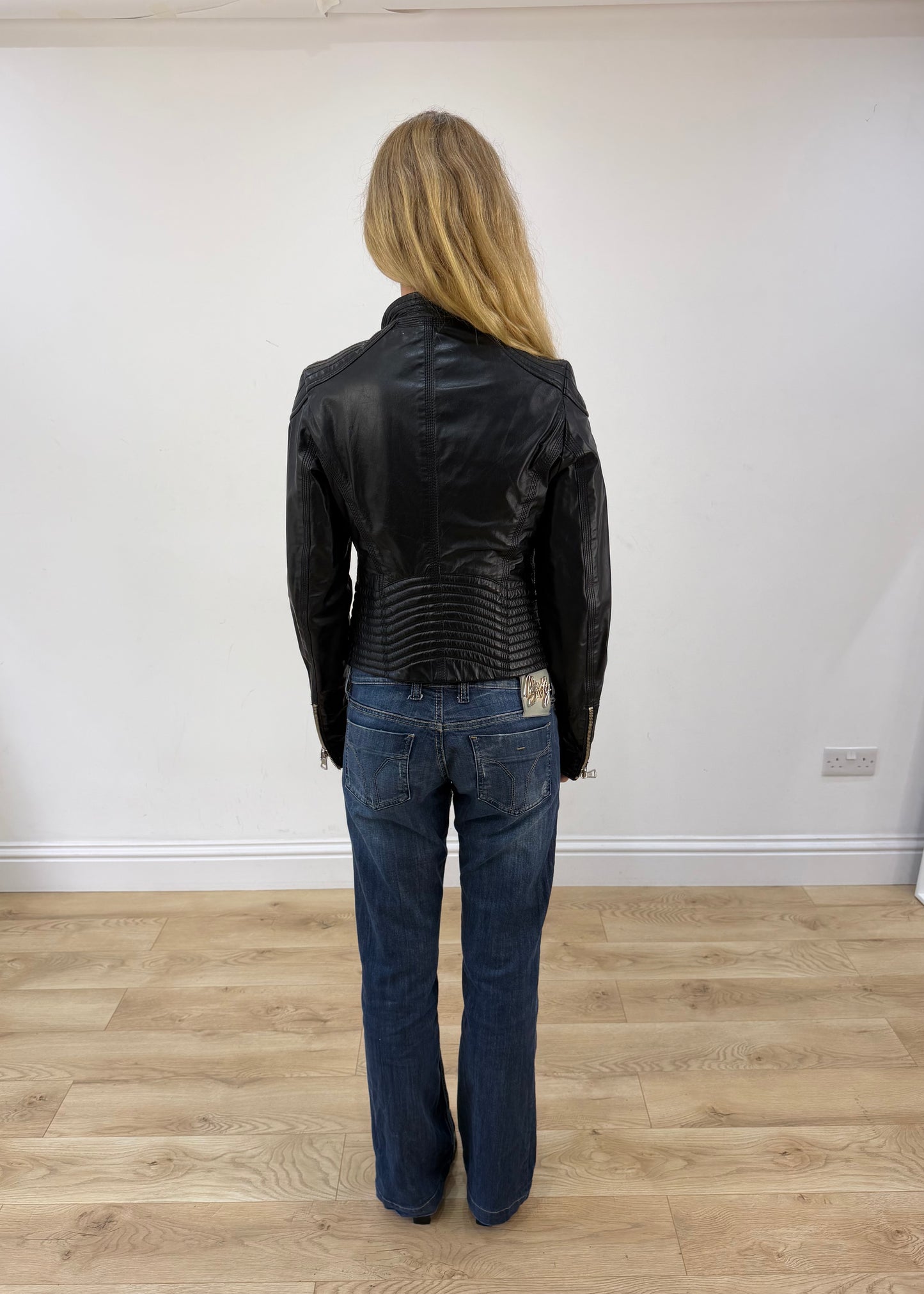 small black zip up leather jacket