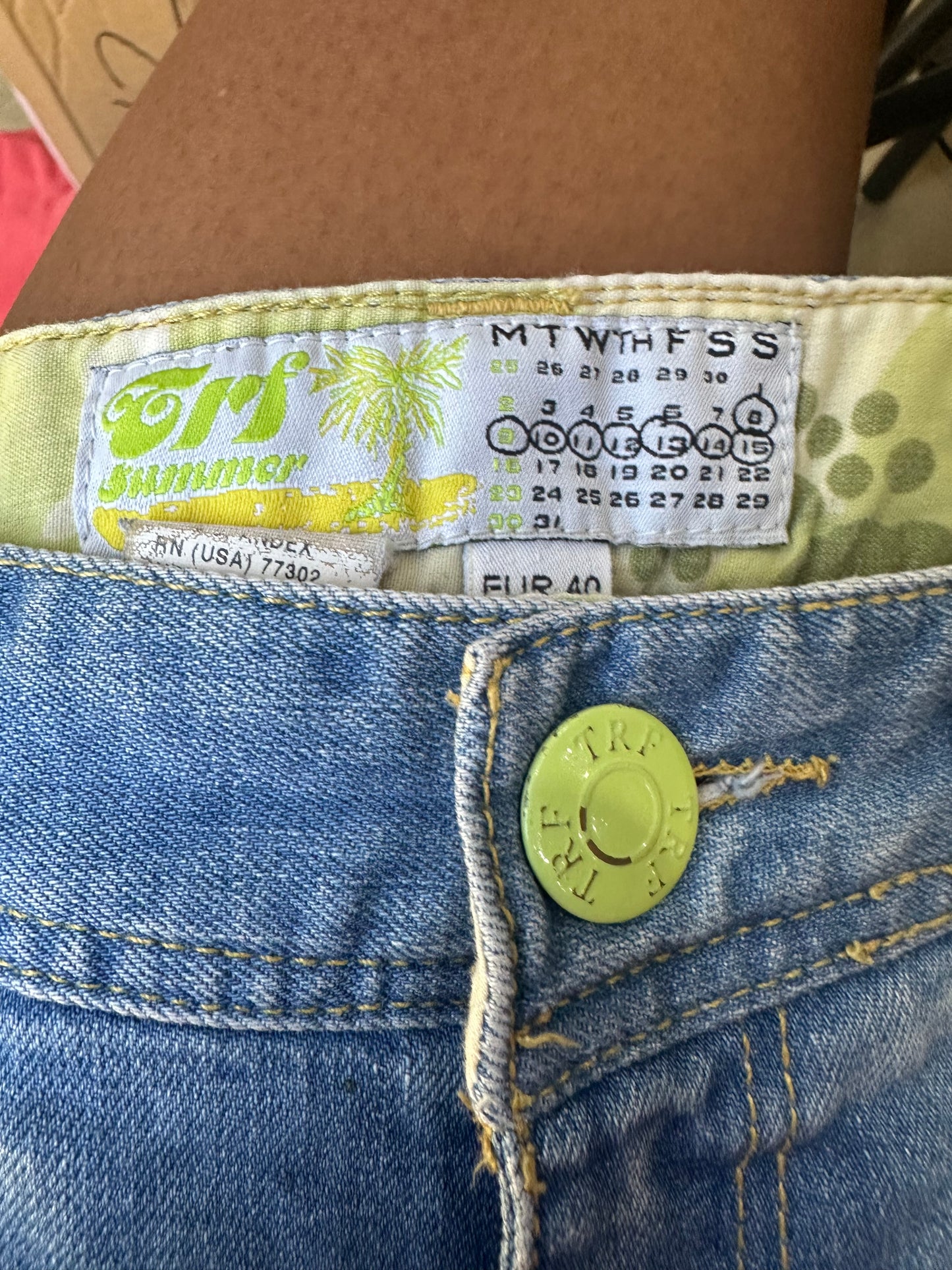 wag drop | medium blue denim mini shorts with yellow detailing