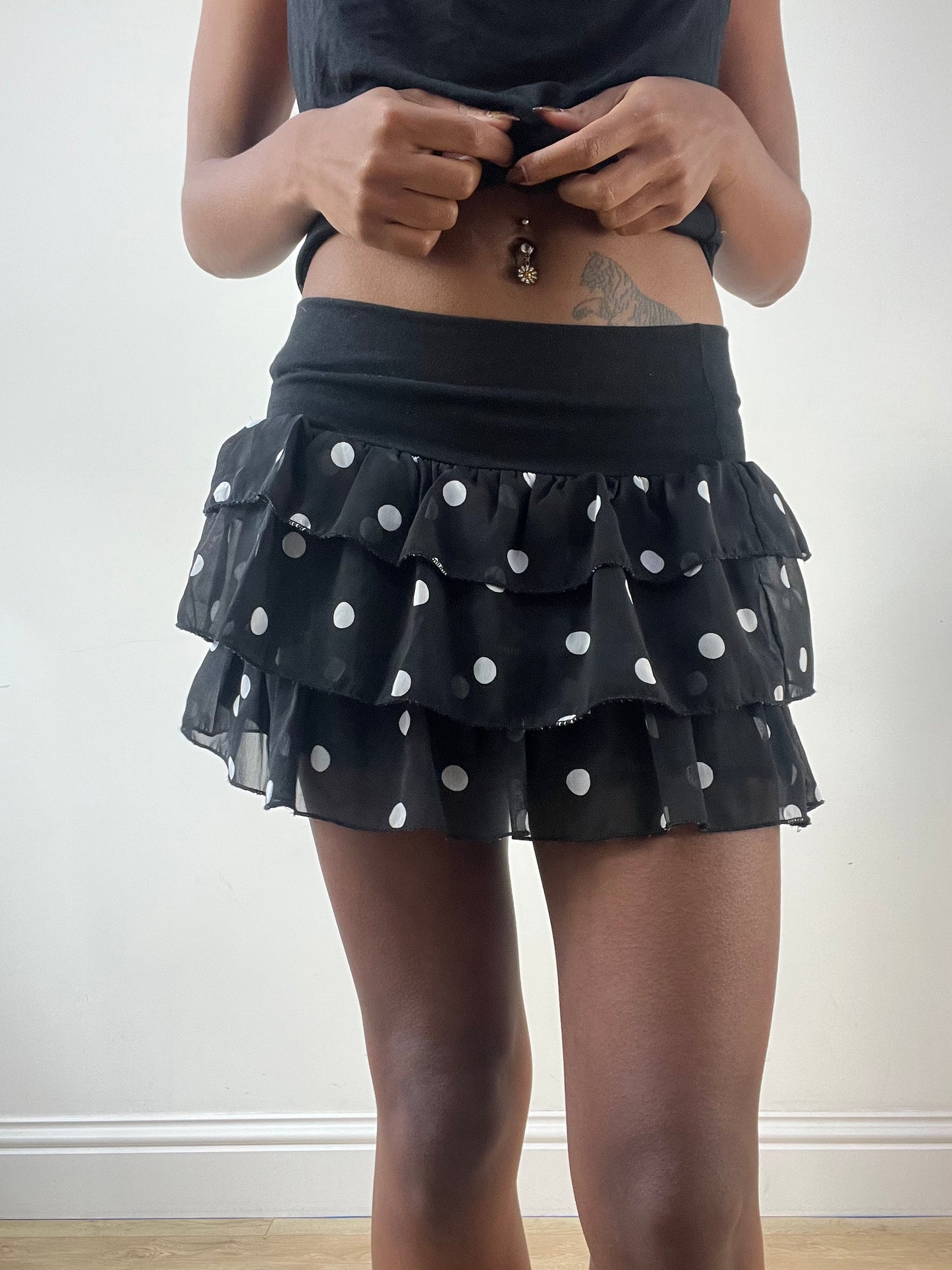 LFW edit | extra small black tiered mini skirt with white polka dot pattern