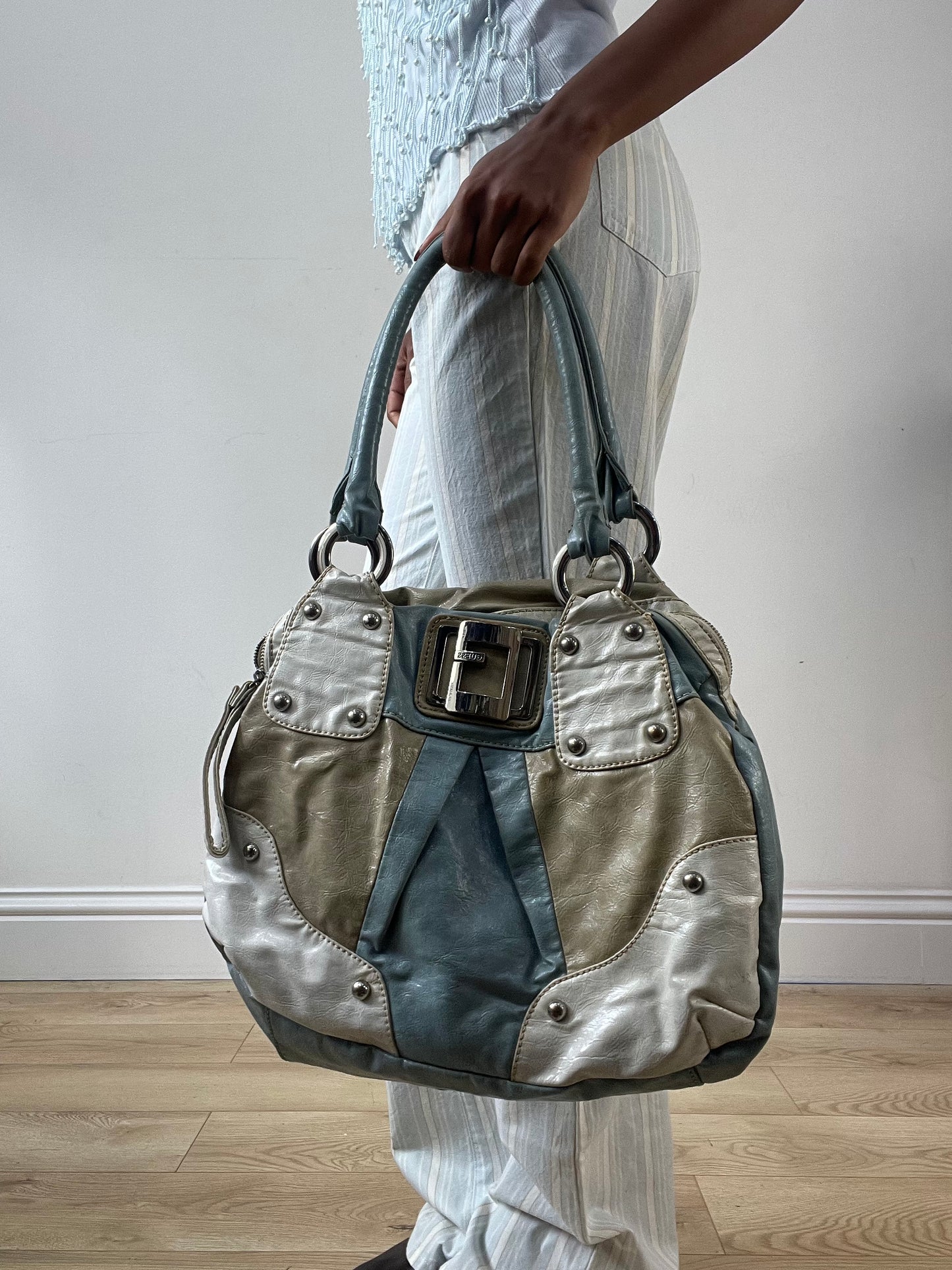 LFW edit | blue and beige guess faux leather bag with silver hardware
