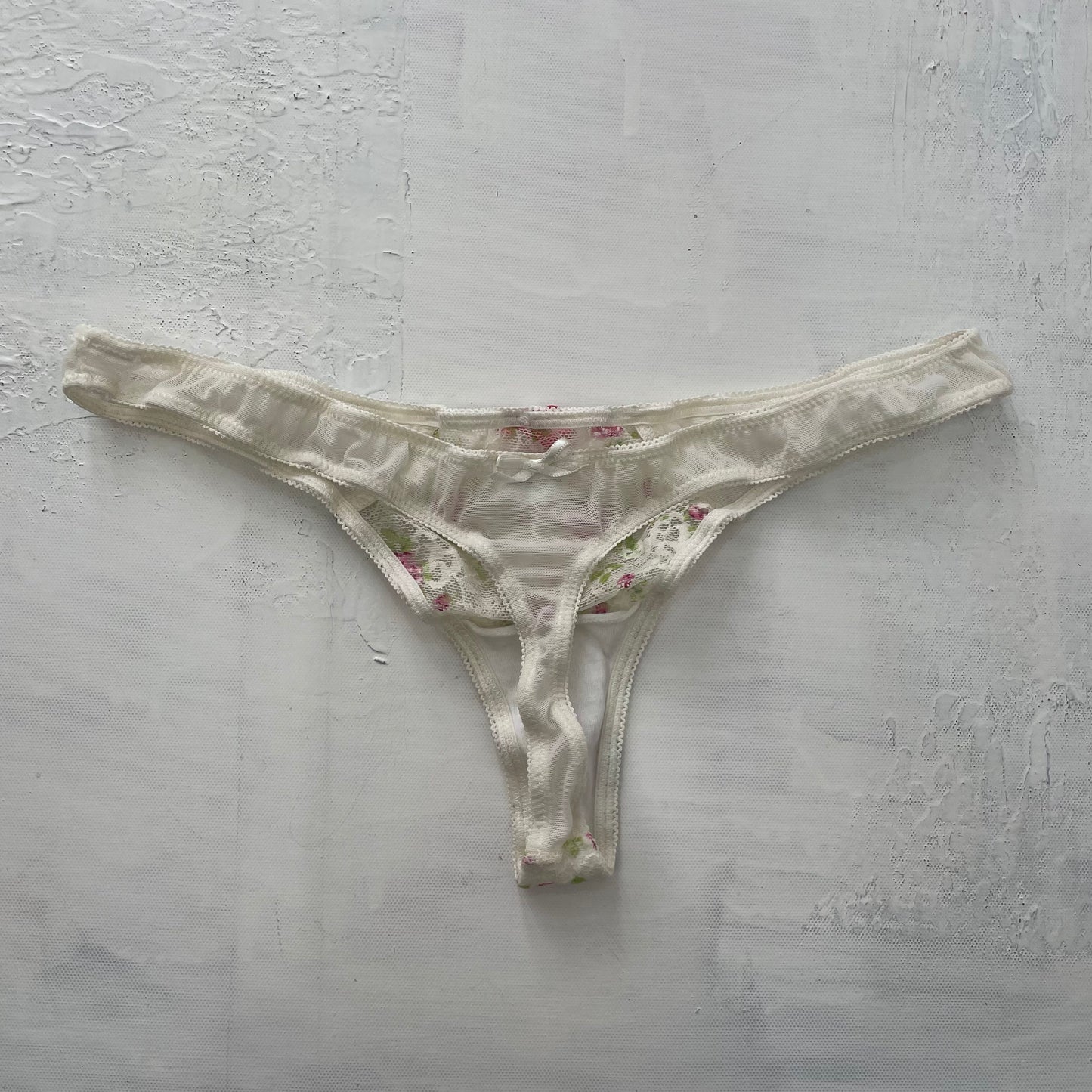GRUNGE COQUETTE DROP | small white mesh thong with floral embroidery