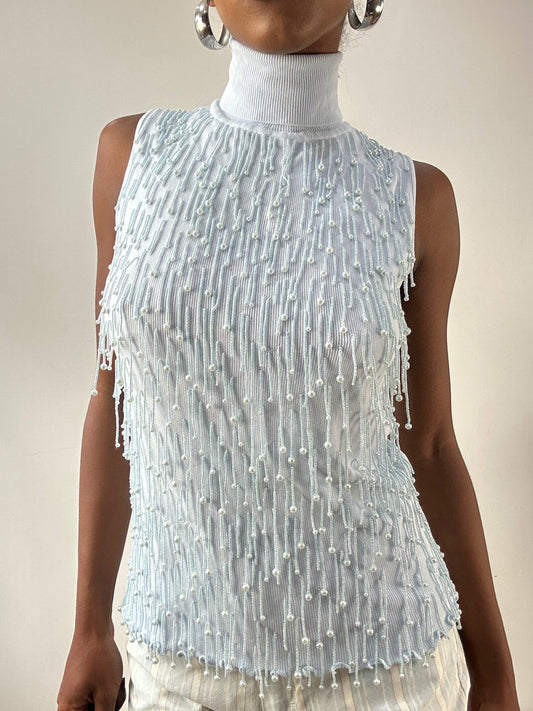 LFW edit | small baby blue sleeveless turtleneck top with beading detail