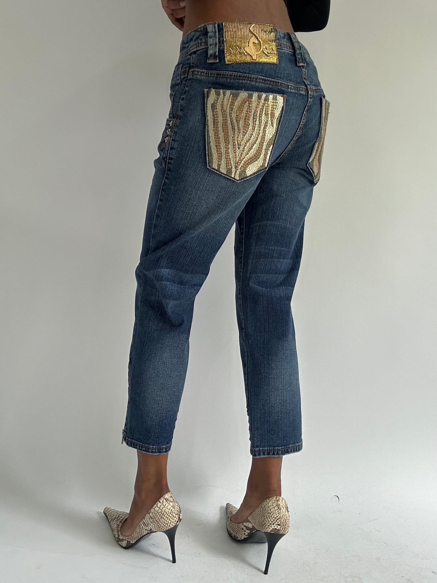 euro trash | medium blue denim cropped jeans with gold zebra detail pockets