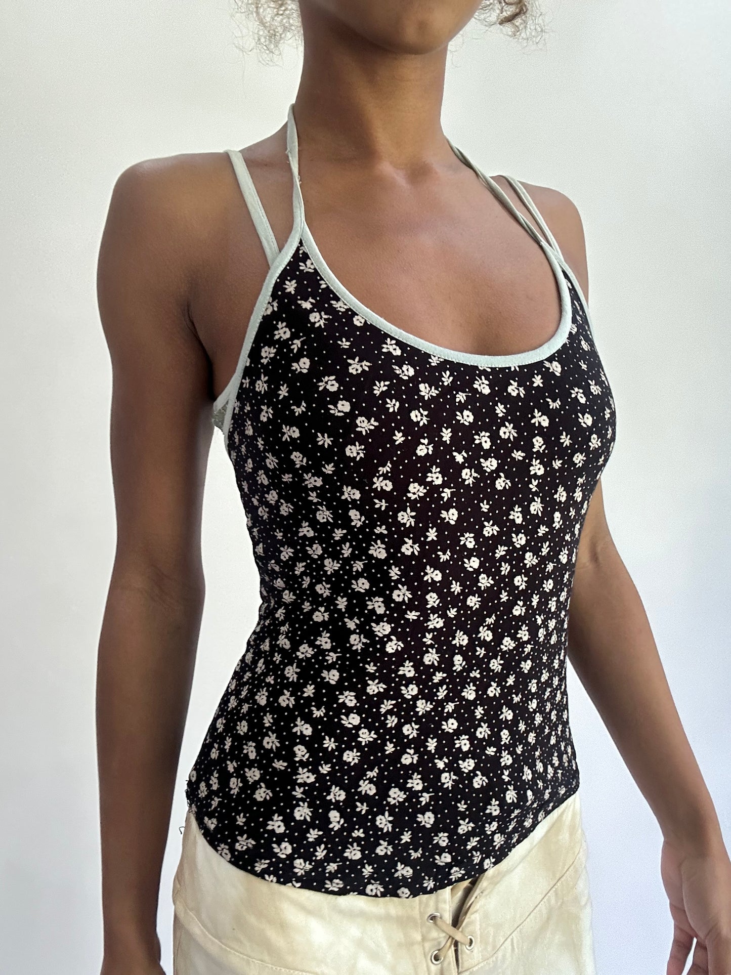olivia rodrigo drop | small black floral halterneck top