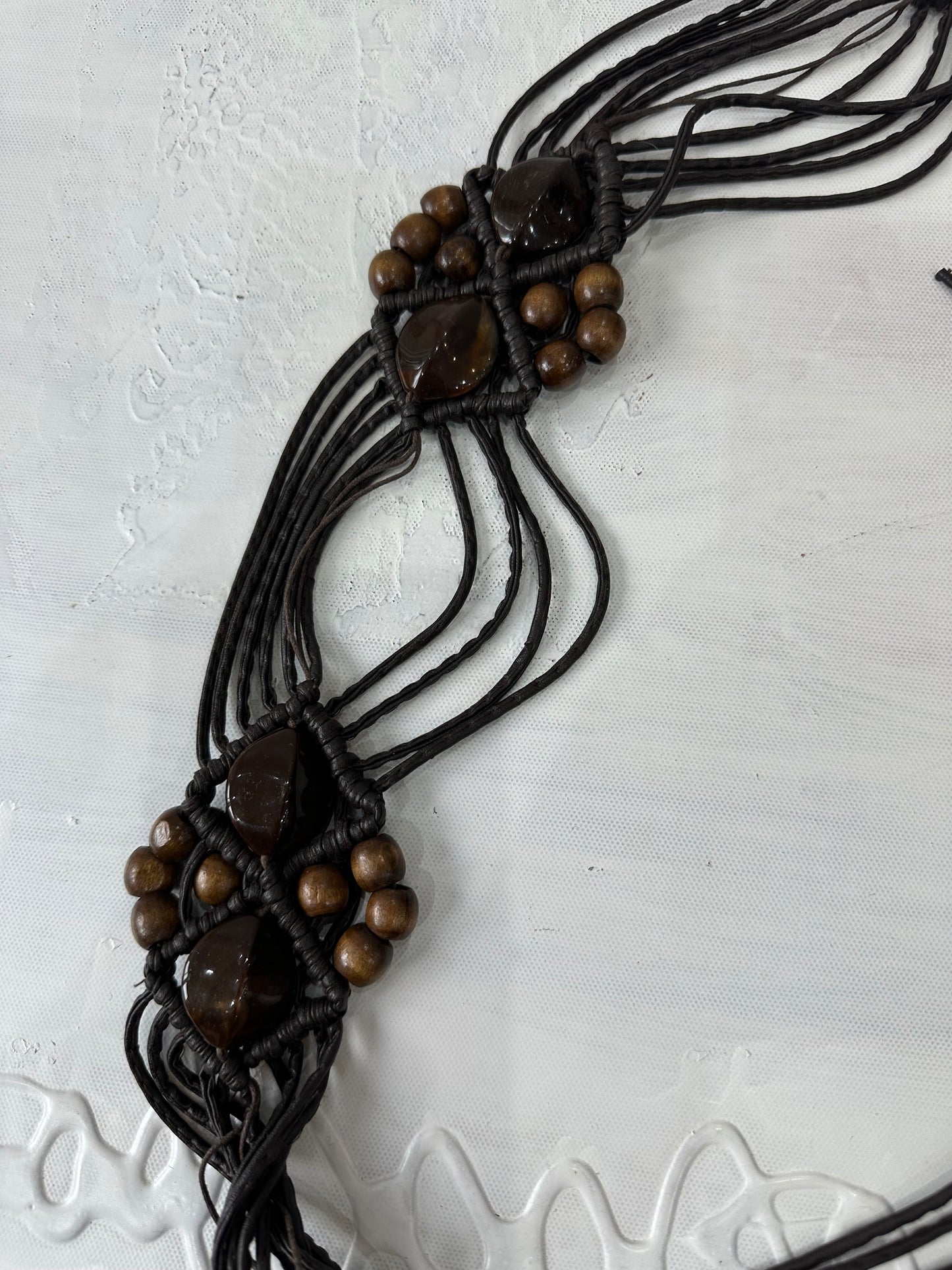 BEST PICKS | brown braided tassel belt with brown beading details