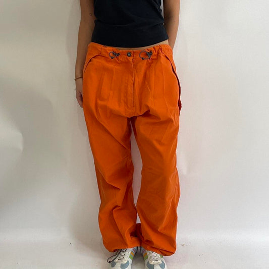 POSH AND BECKS DROP | medium orange oversized cargo trousers with toggle detail