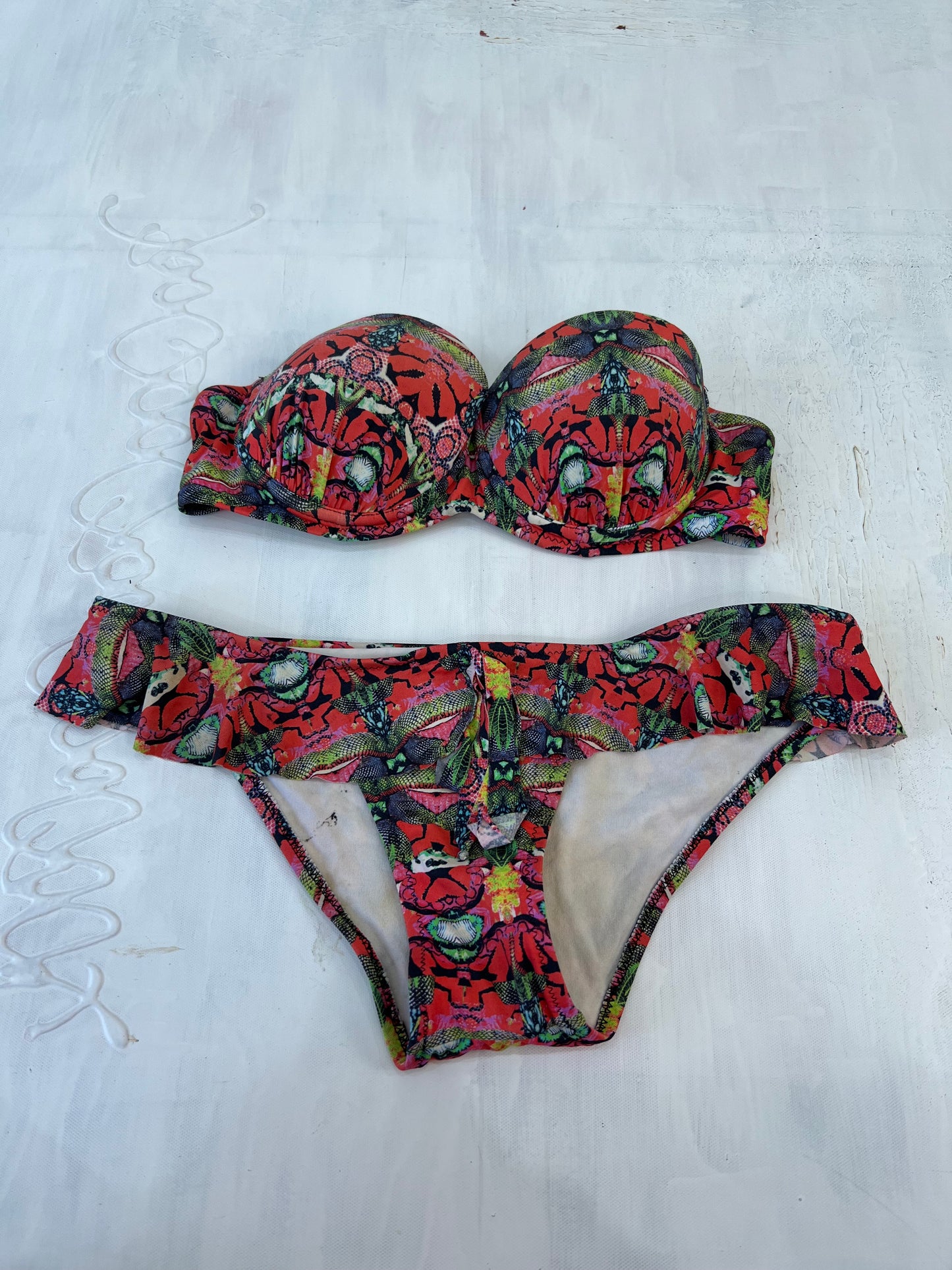summer edit | medium red and green bandeau style bikini set with abstract print all over