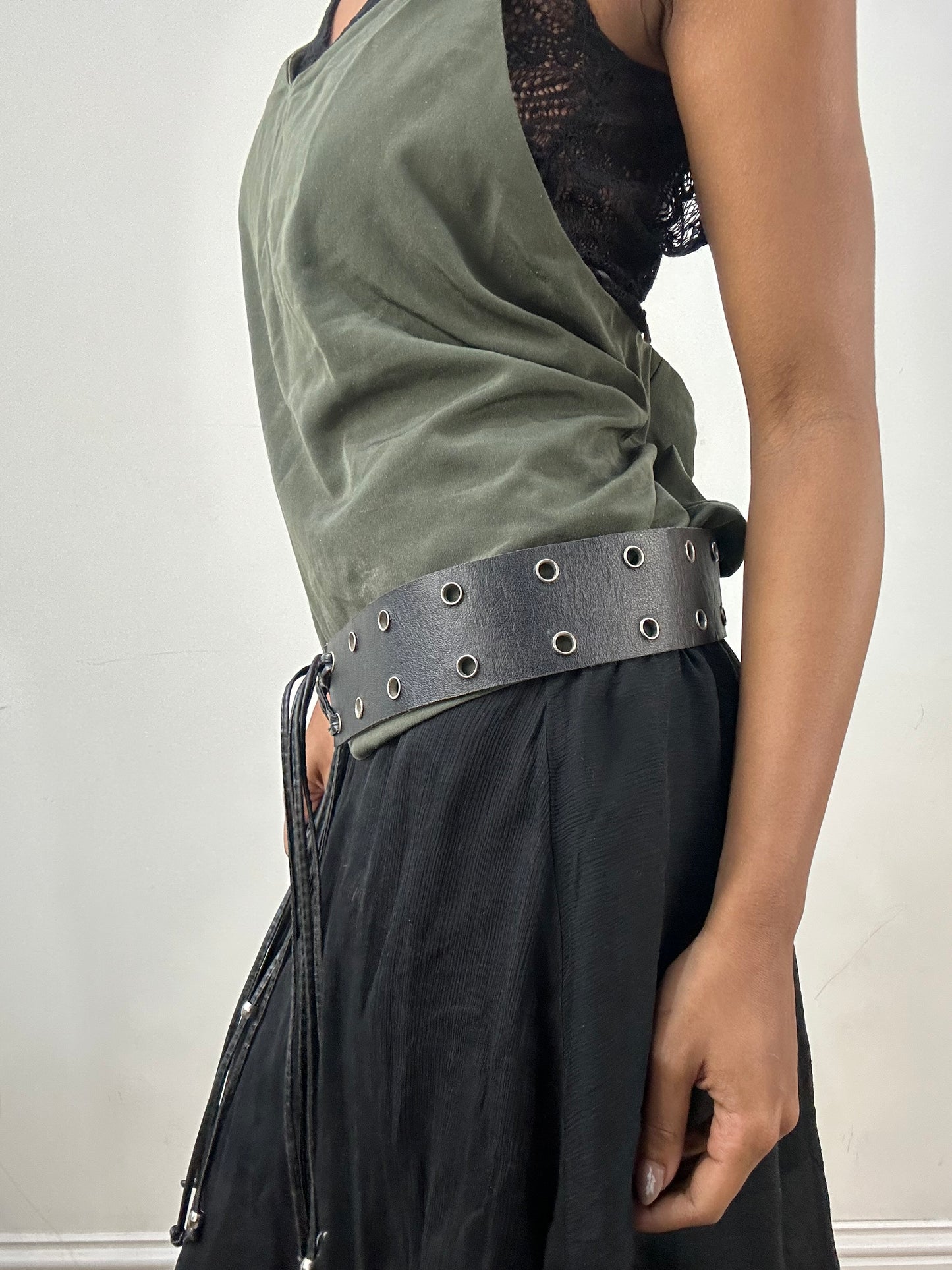 vintage edit: indie sleaze | black faux leather belt with silver eyelet details