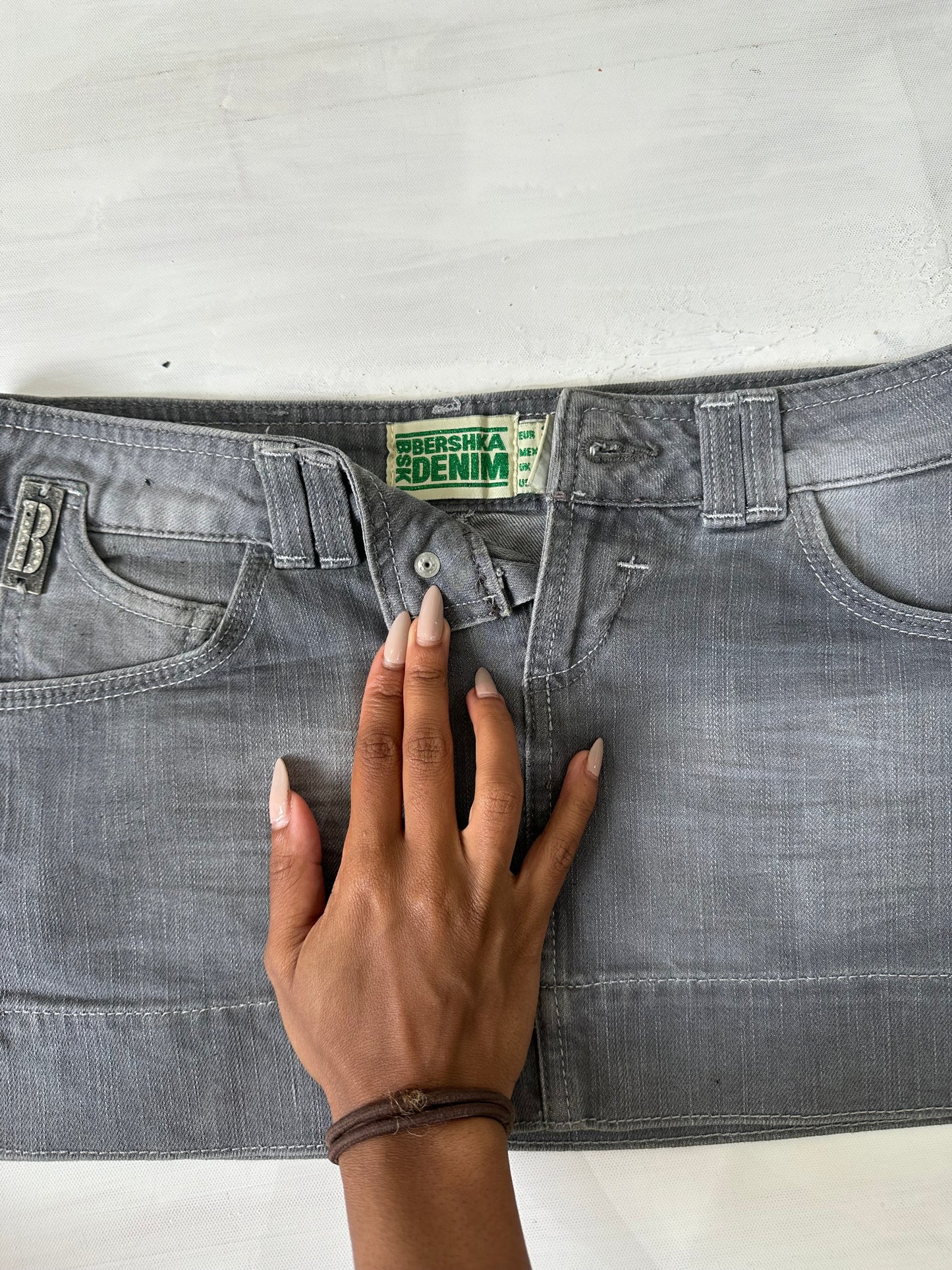 euro trash | small grey old label bershka mini skirt