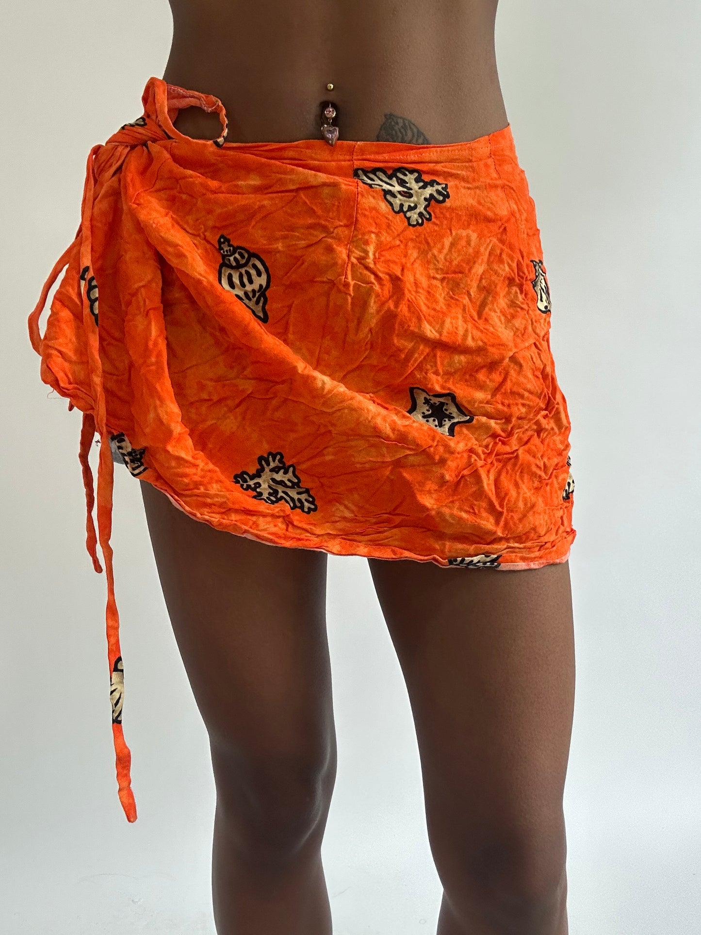 BEST PICKS | small orange patterned beach wrap skirt