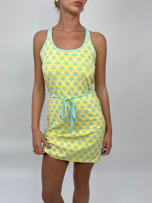 COCONUT GIRL DROP | medium yellow dress with blue floral print all over