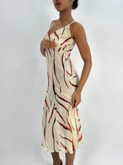 selección destacada | vestido midi con estampado de color negro beige pequeño