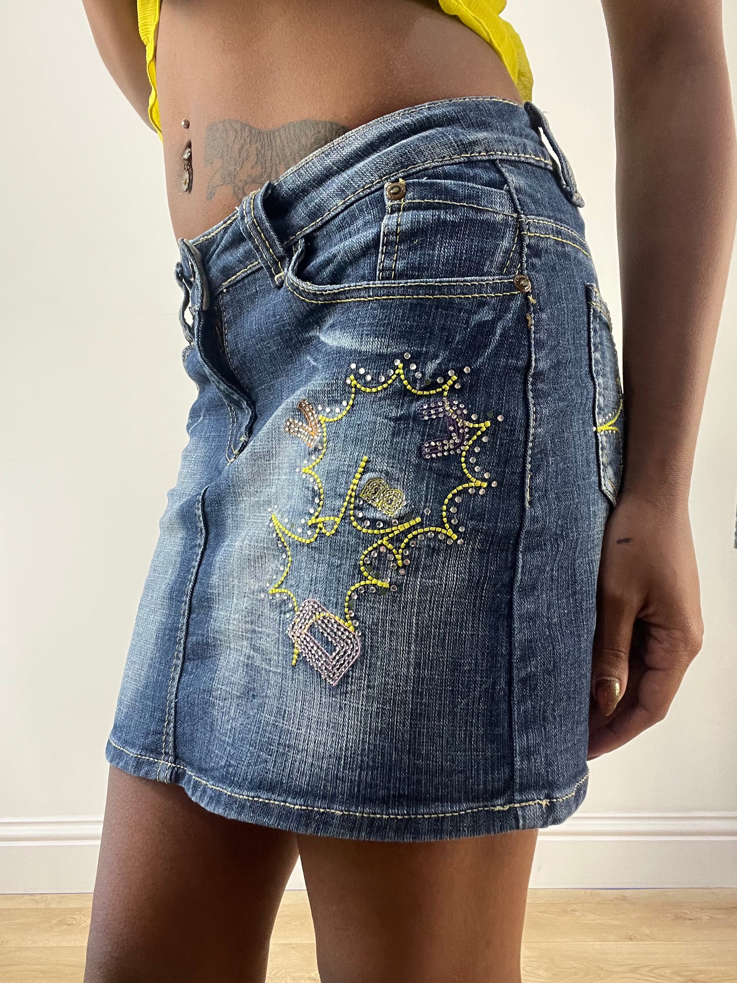 LFW edit | small blue denim mini skirt with embroidery
