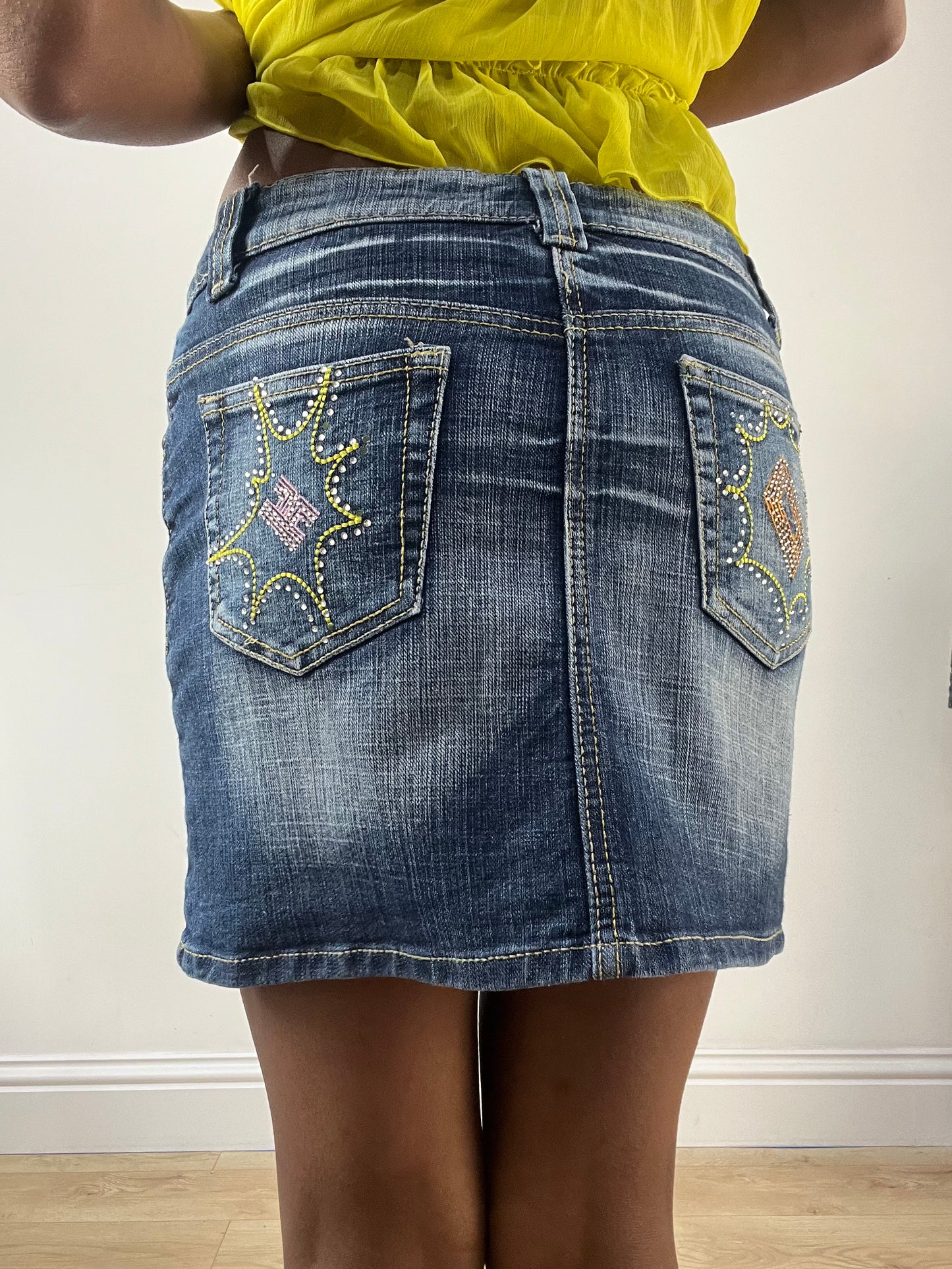 LFW edit | small blue denim mini skirt with embroidery