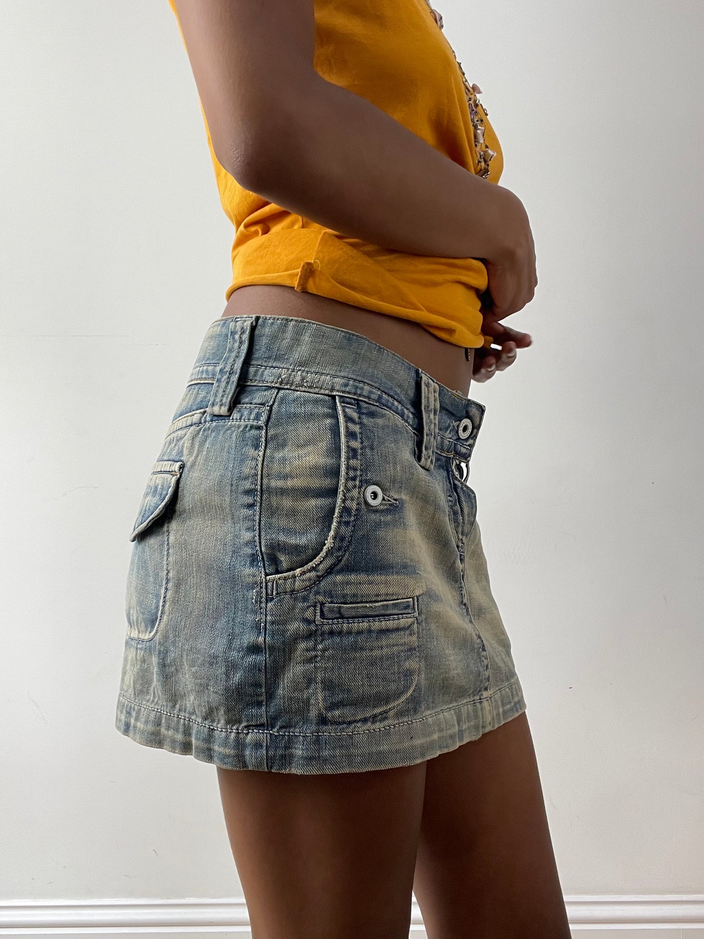 midsummer edit | small light blue denim mini skirt with pocket detail